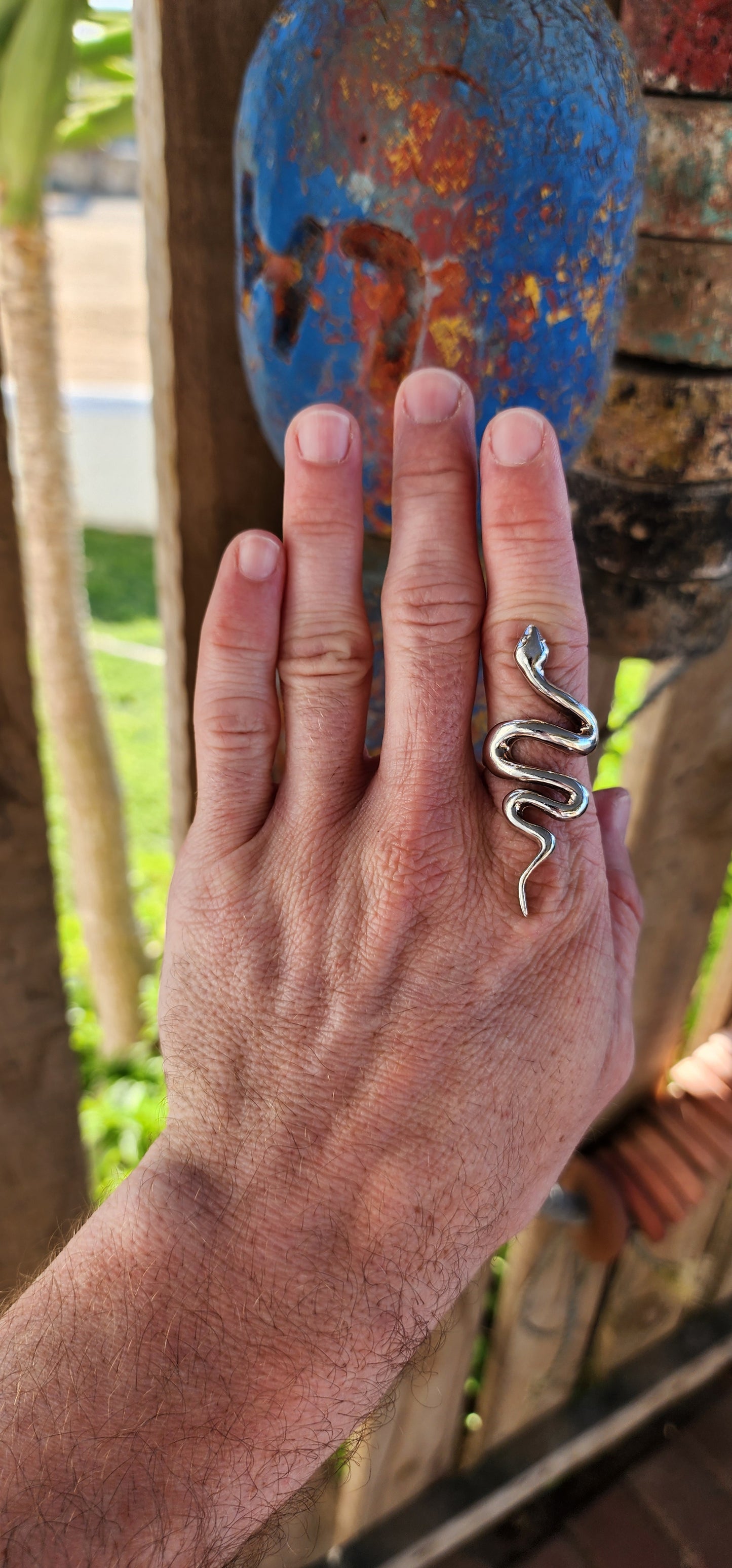 This chunky sterling silver serpent ring is a striking fusion of power, mystery, and elegance. Sculpted with a smooth, high-polish finish, the snake coils effortlessly around the finger.
