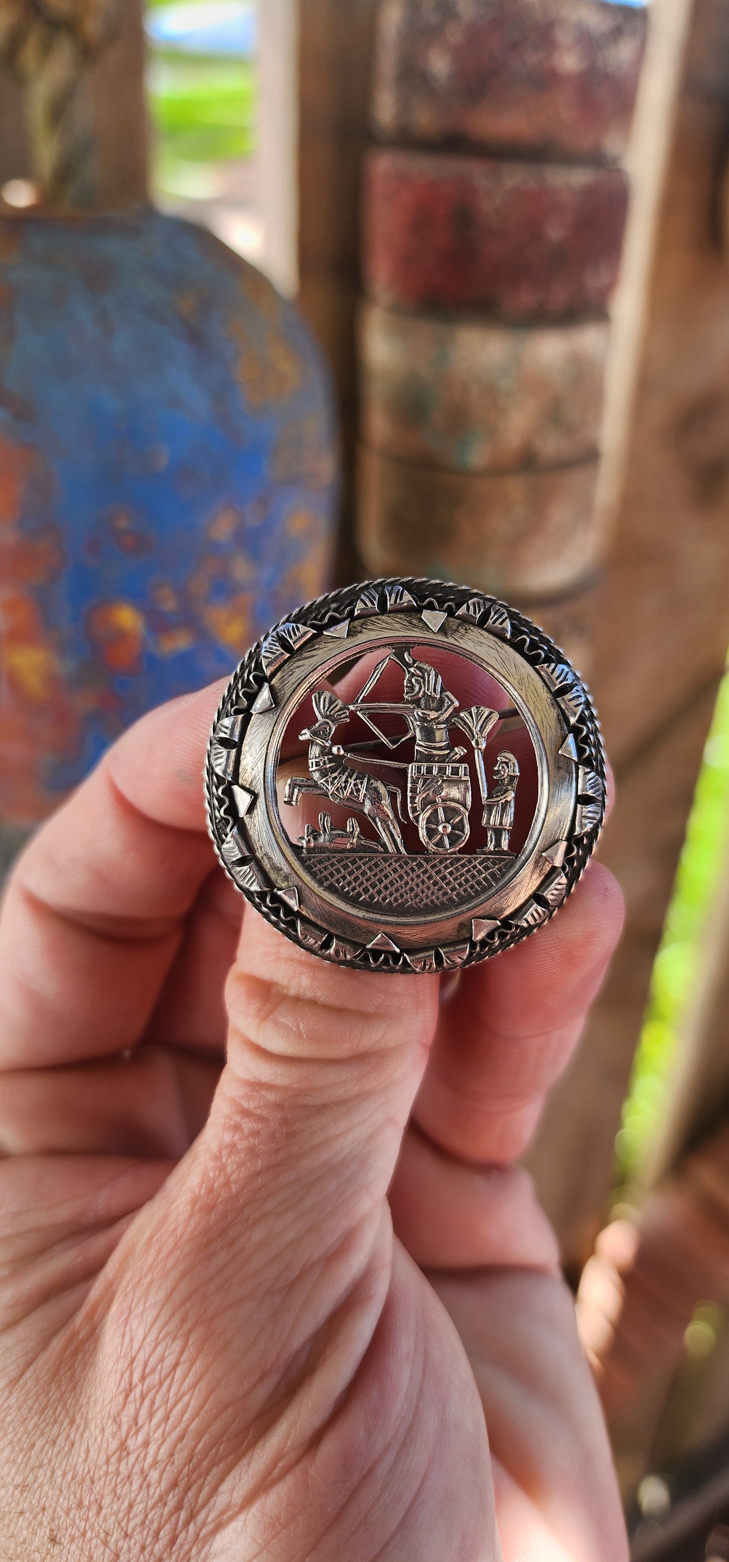 This 1940/50's Egyptian Revival sterling silver brooch is a stunning and intricately crafted piece that pays homage to the grandeur of ancient Egypt.