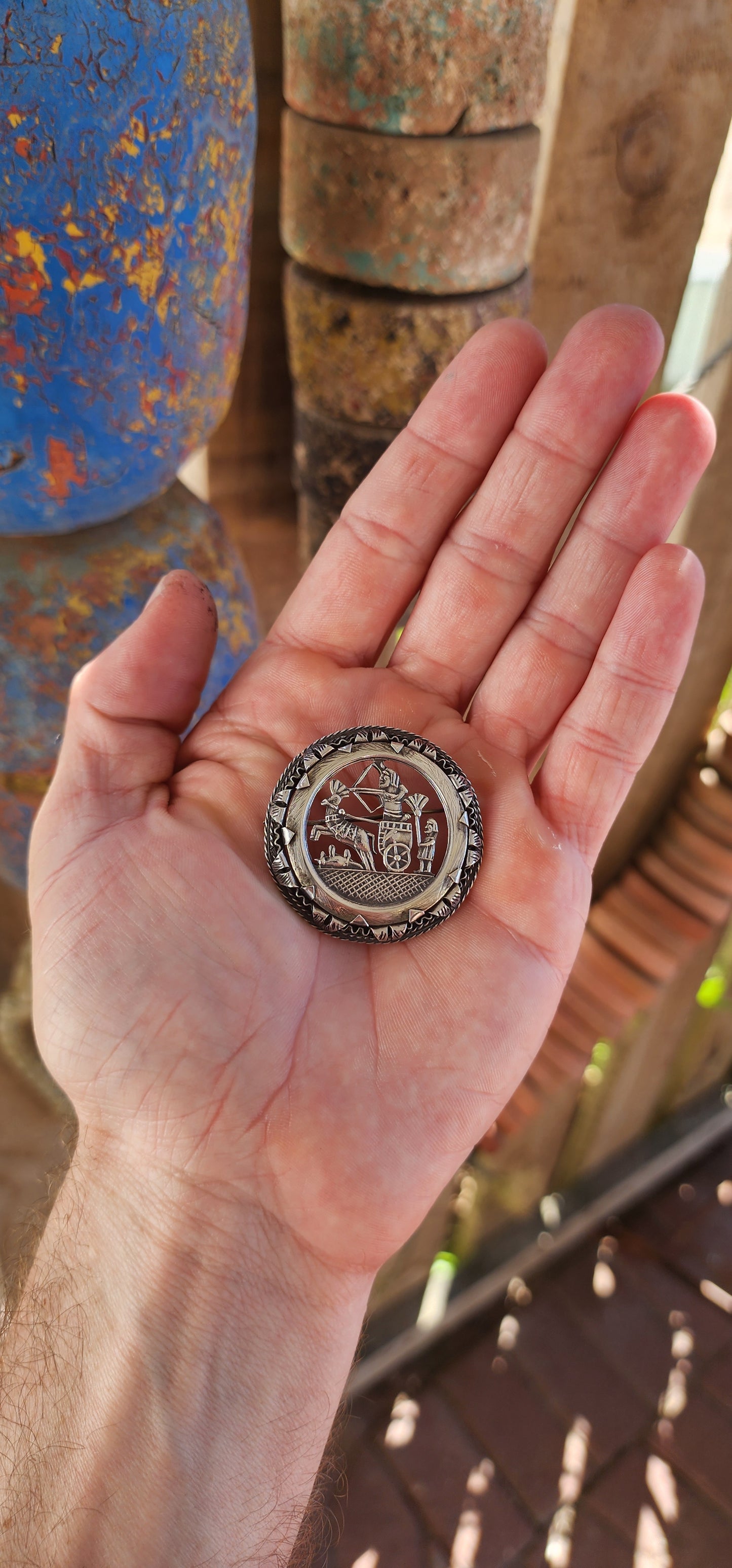This 1940/50's Egyptian Revival sterling silver brooch is a stunning and intricately crafted piece that pays homage to the grandeur of ancient Egypt.