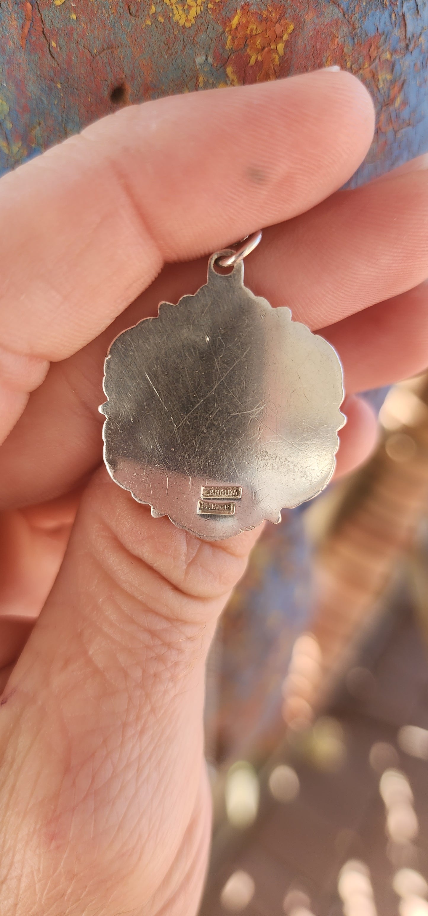 This beautiful vintage CANDIDA sterling silver Saint Christopher pendant is a truly special piece, not only for its craftsmanship but also for its provenance.