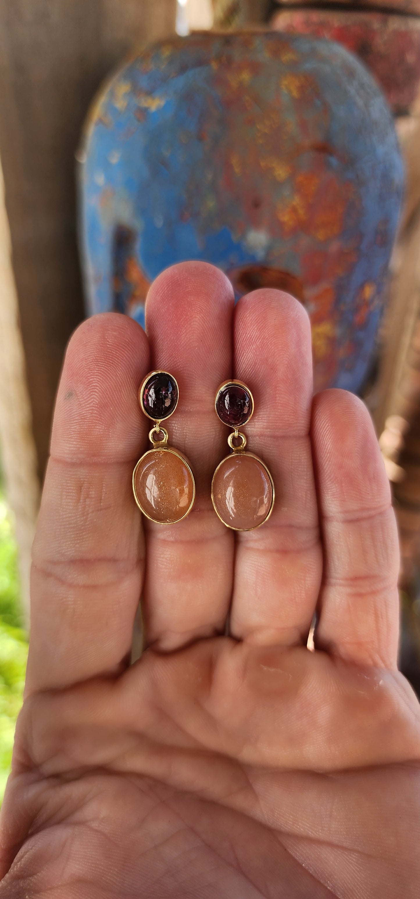 These exquisite two-tier drop earrings are a perfect blend of elegance and warmth, crafted from sterling silver with an opulent 18ct yellow gold plating.
