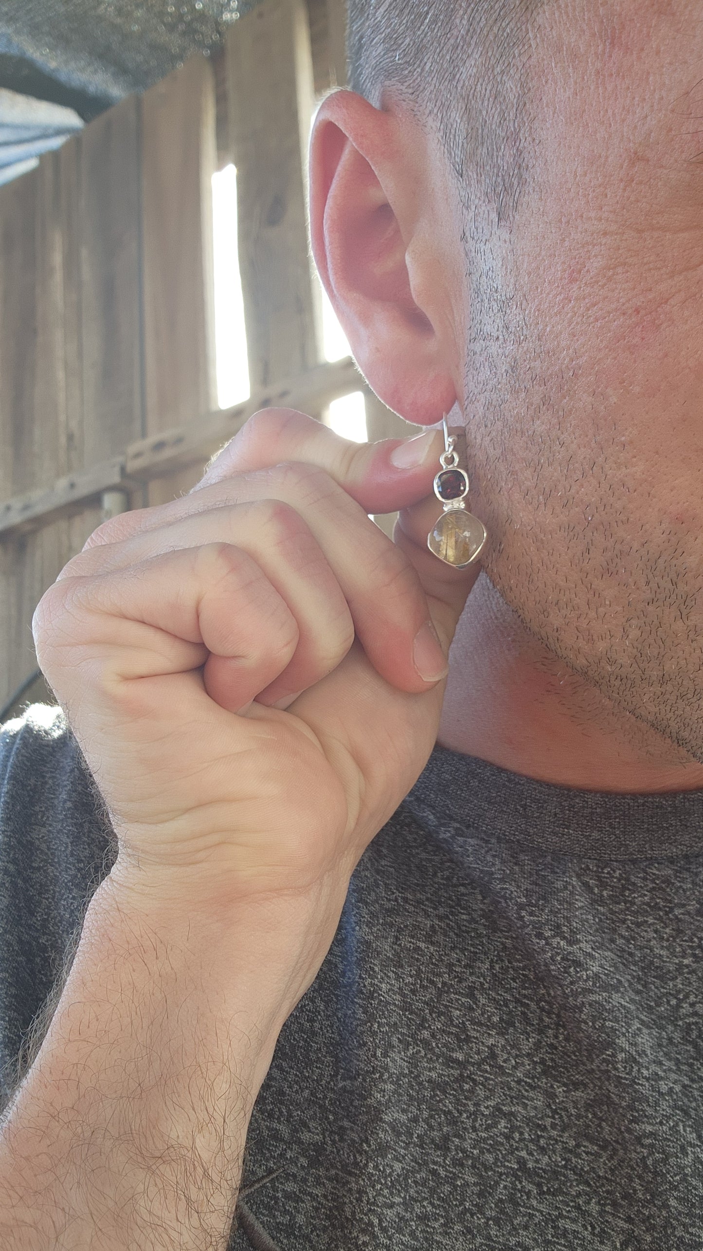 These sterling silver drop earrings are the perfect fusion of fire and earth, a mesmerizing dance between passion and mystique.