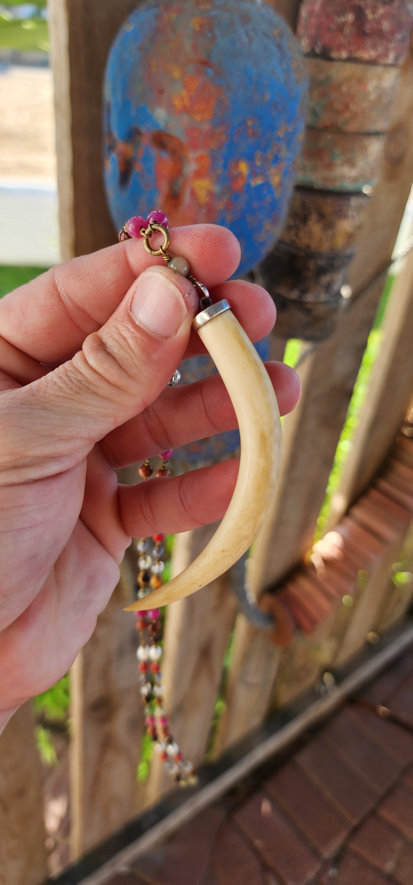 This large pre-ban ivory and sterling silver tusk pendant necklace is an absolute showstopper—bold, eclectic, and steeped in history. It’s the kind of piece that effortlessly blends tribal elegance, bohemian flair, and artisanal craftsmanship.