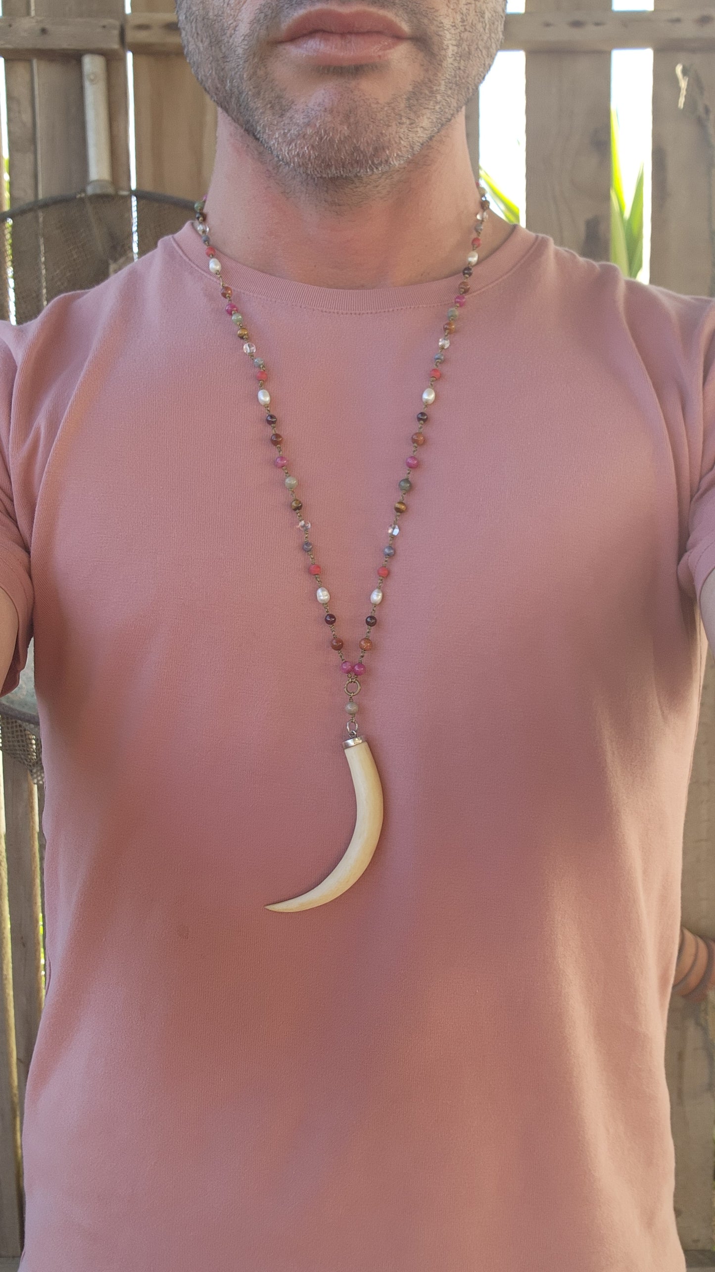 This large pre-ban ivory and sterling silver tusk pendant necklace is an absolute showstopper—bold, eclectic, and steeped in history. It’s the kind of piece that effortlessly blends tribal elegance, bohemian flair, and artisanal craftsmanship.
