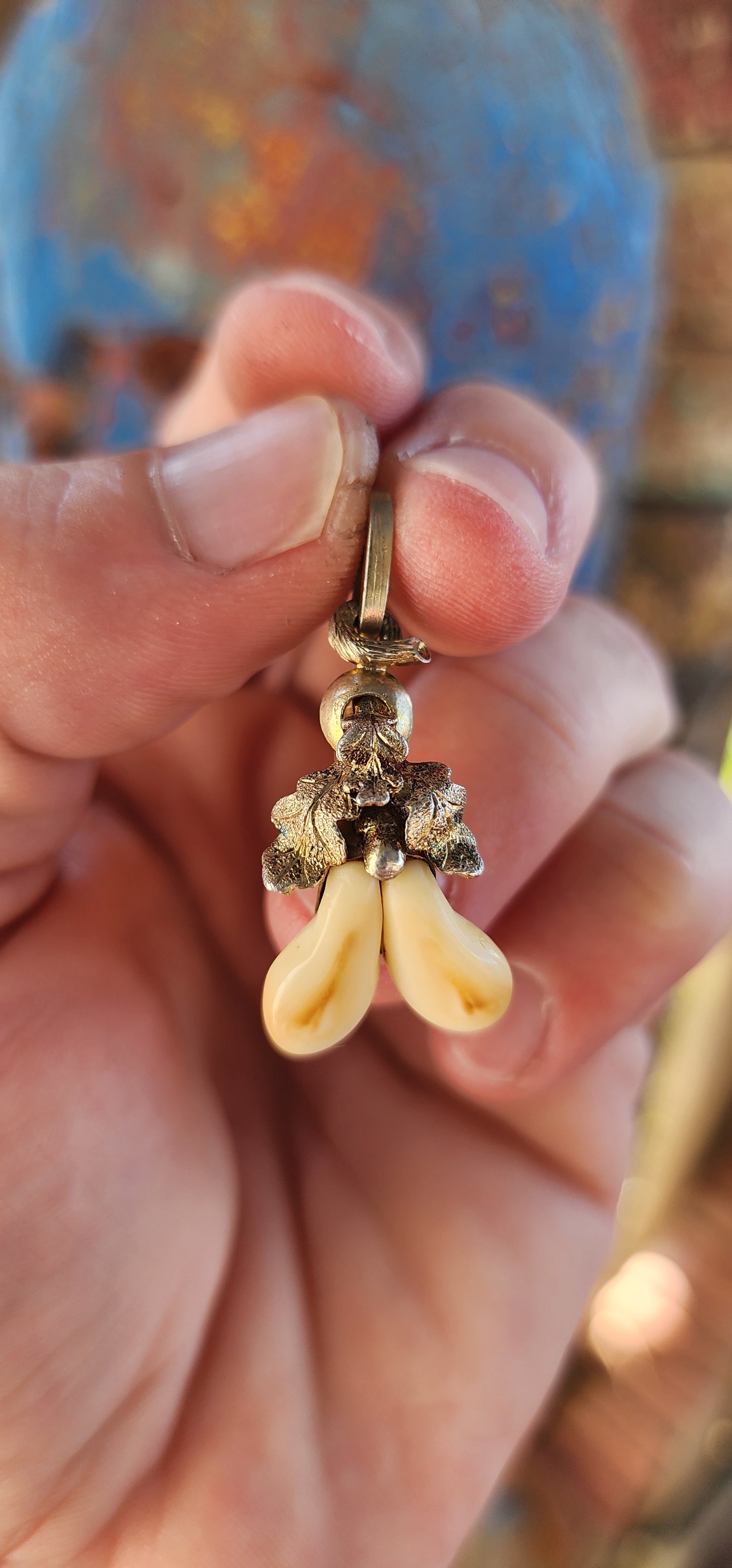 This exquisite Antique German Victorian-era hunter’s love token pendant is a fine example of romantic and symbolic jewelry crafted in 800 silver with a gold gilt finish.