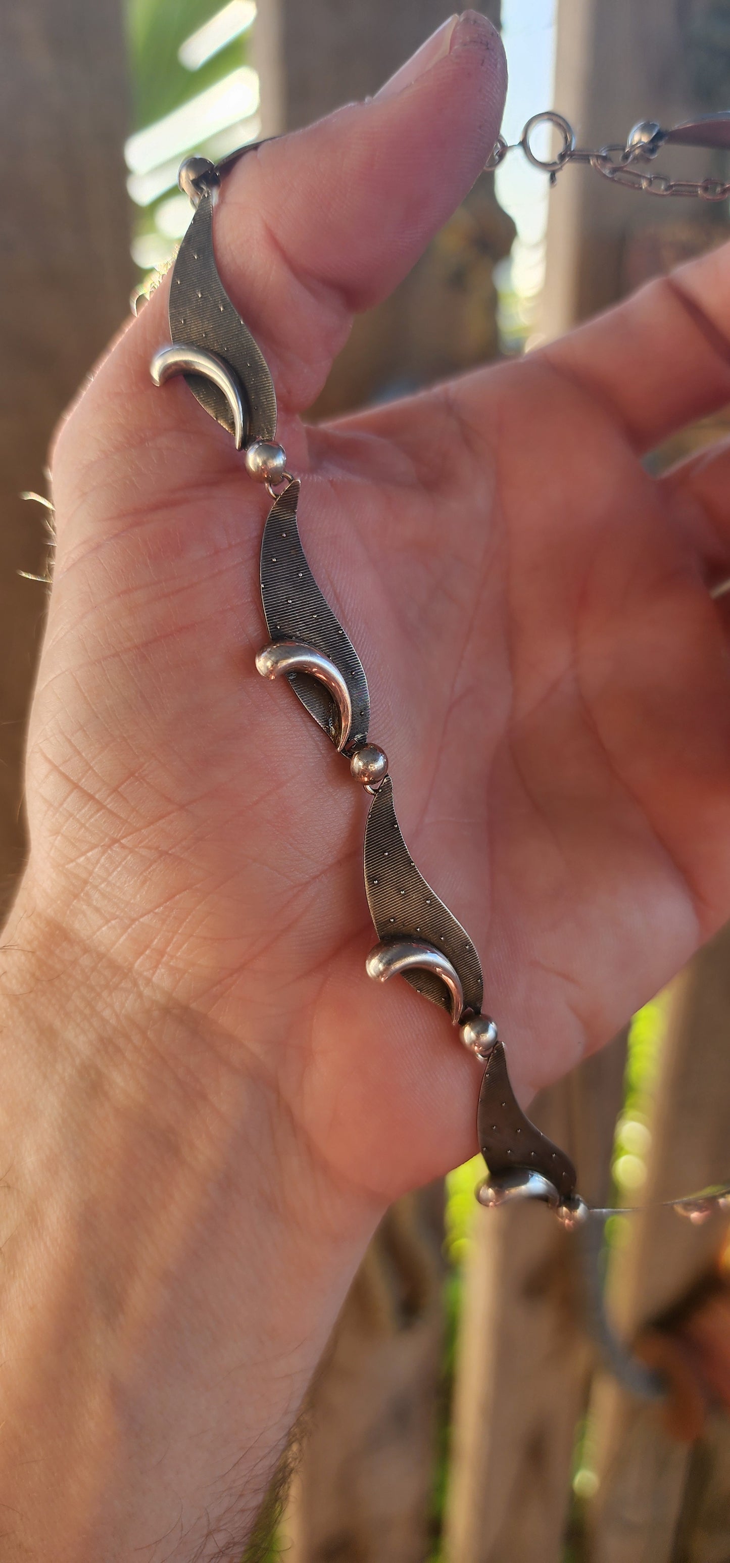 This vintage modernist sterling silver necklace by Kordes & Lichtenfels from the 1960s is an exceptional piece that embodies mid-century German design.