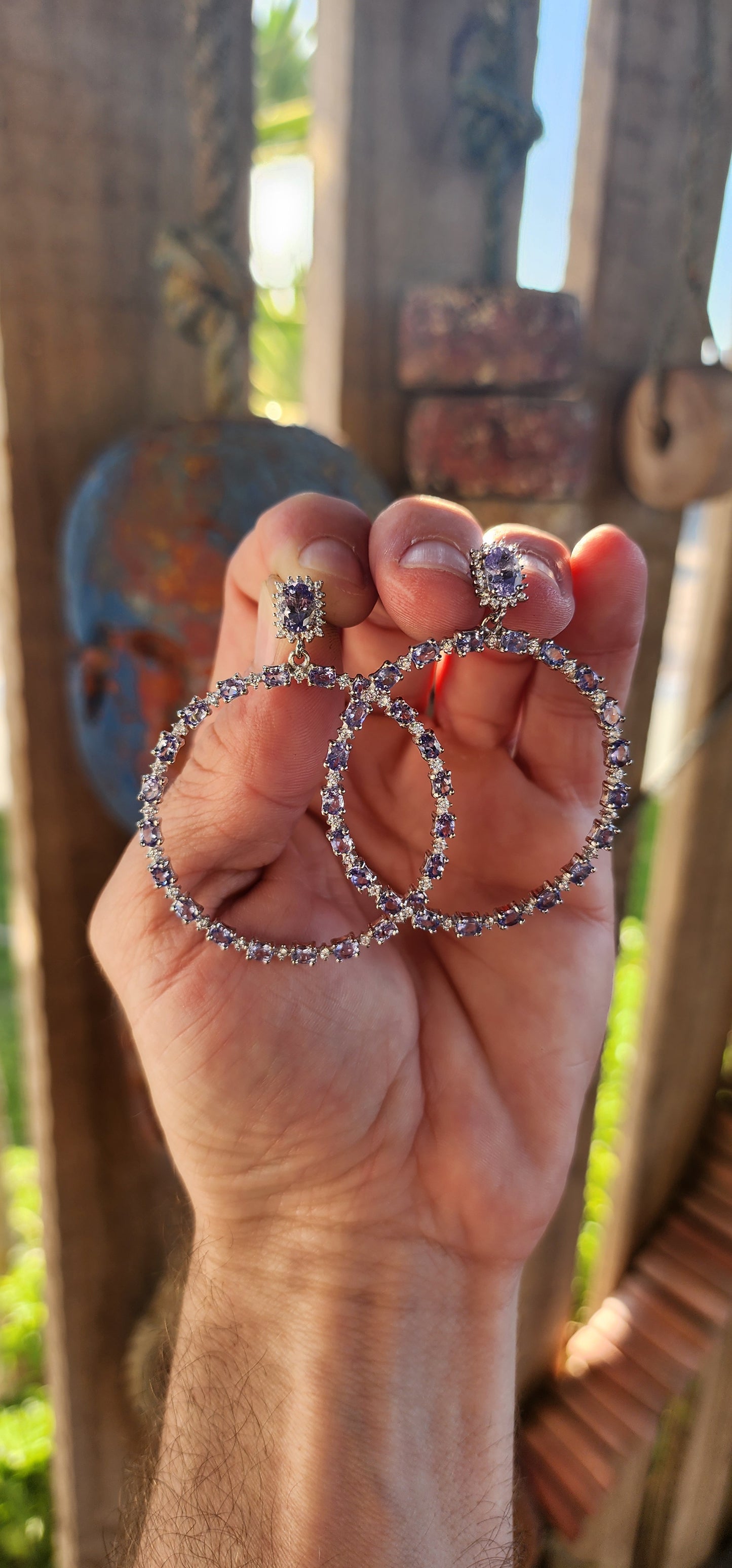 These breathtaking STATEMENT earrings are an exquisite display of refined elegance and meticulous craftsmanship, designed to captivate with their radiant sparkle and bold yet graceful presence.