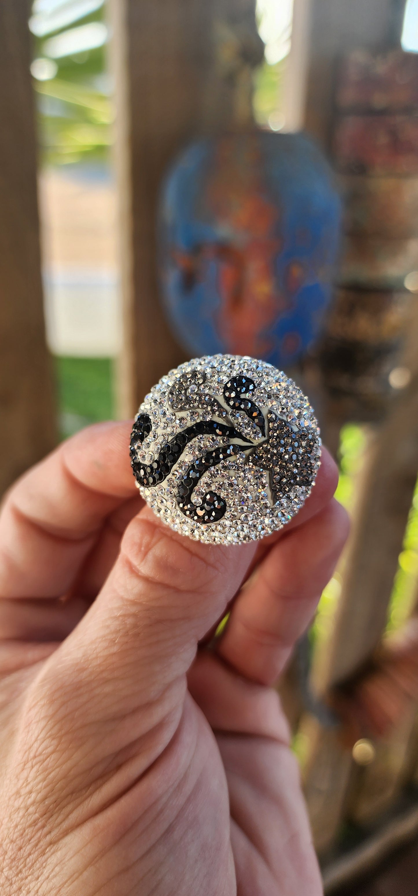 This ultra-sparkly cosmic statement ring is a true celestial marvel, designed to captivate and dazzle with every movement.