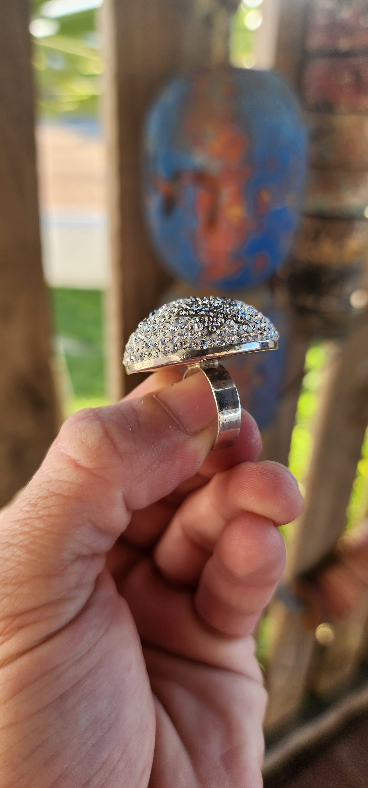 This ultra-sparkly cosmic statement ring is a true celestial marvel, designed to captivate and dazzle with every movement.