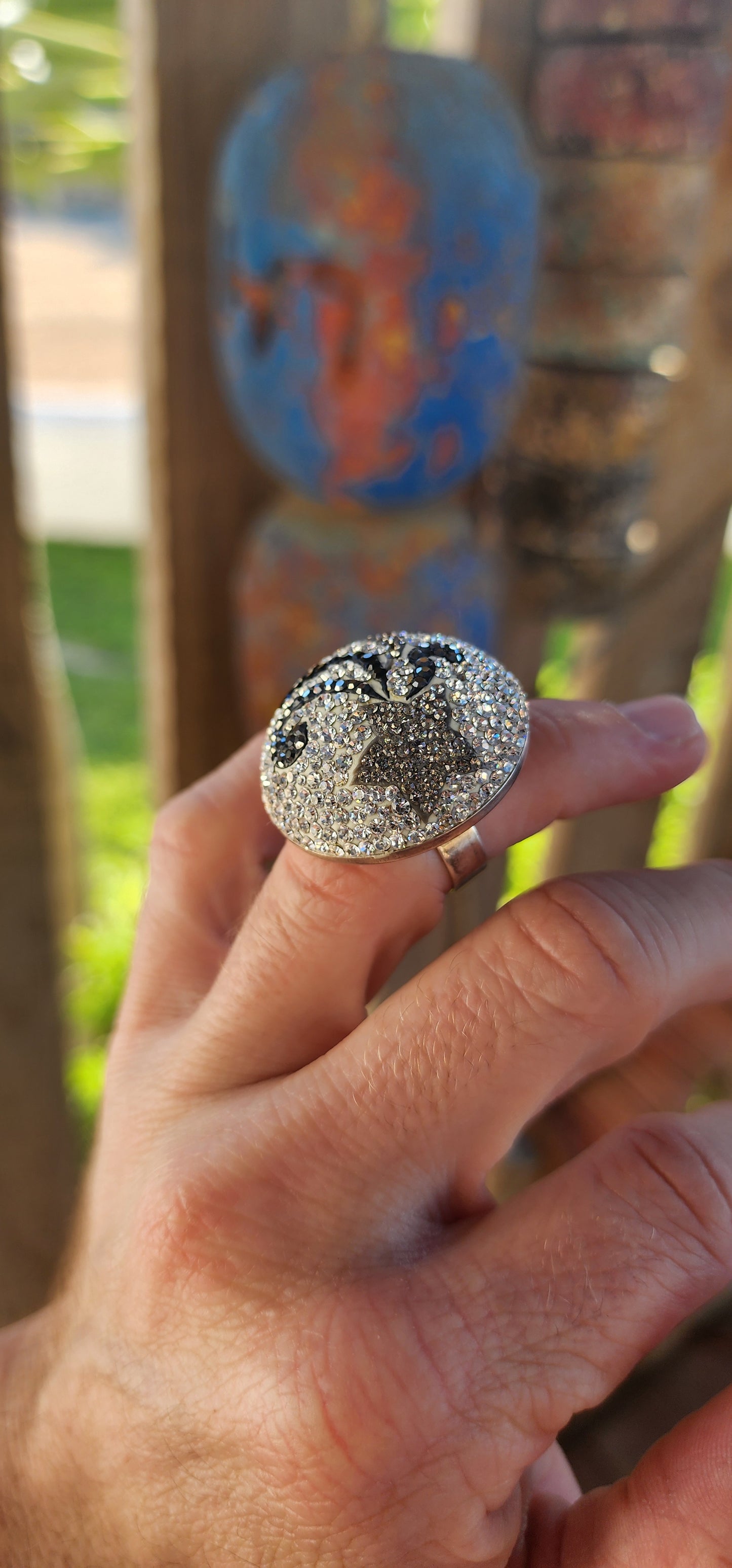 This ultra-sparkly cosmic statement ring is a true celestial marvel, designed to captivate and dazzle with every movement.