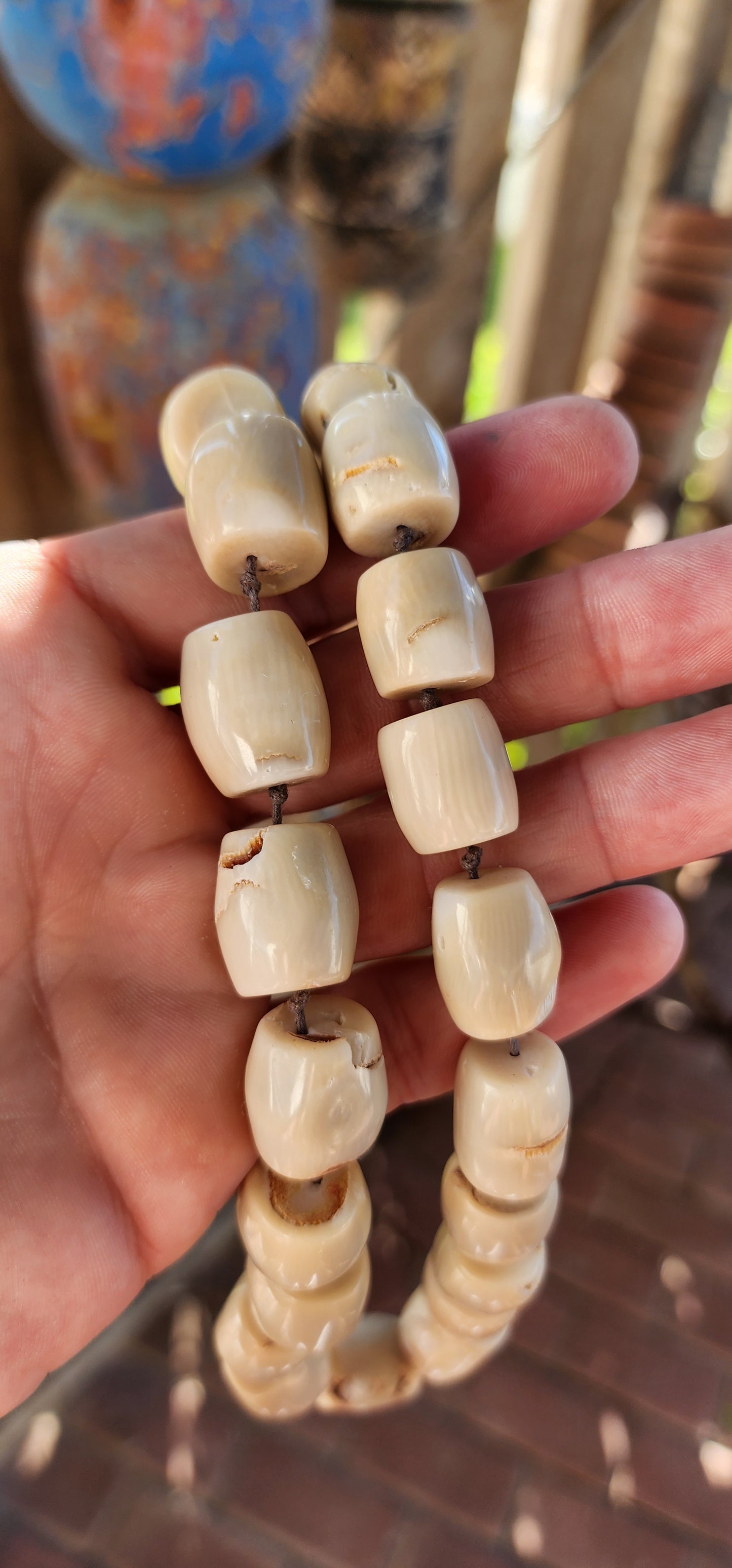 Meet your new statement-maker! This bold and earthy necklace features chunky barrel-shaped bamboo coral beads in a soft creamy white hue, each one unique with its own natural grooves and character.