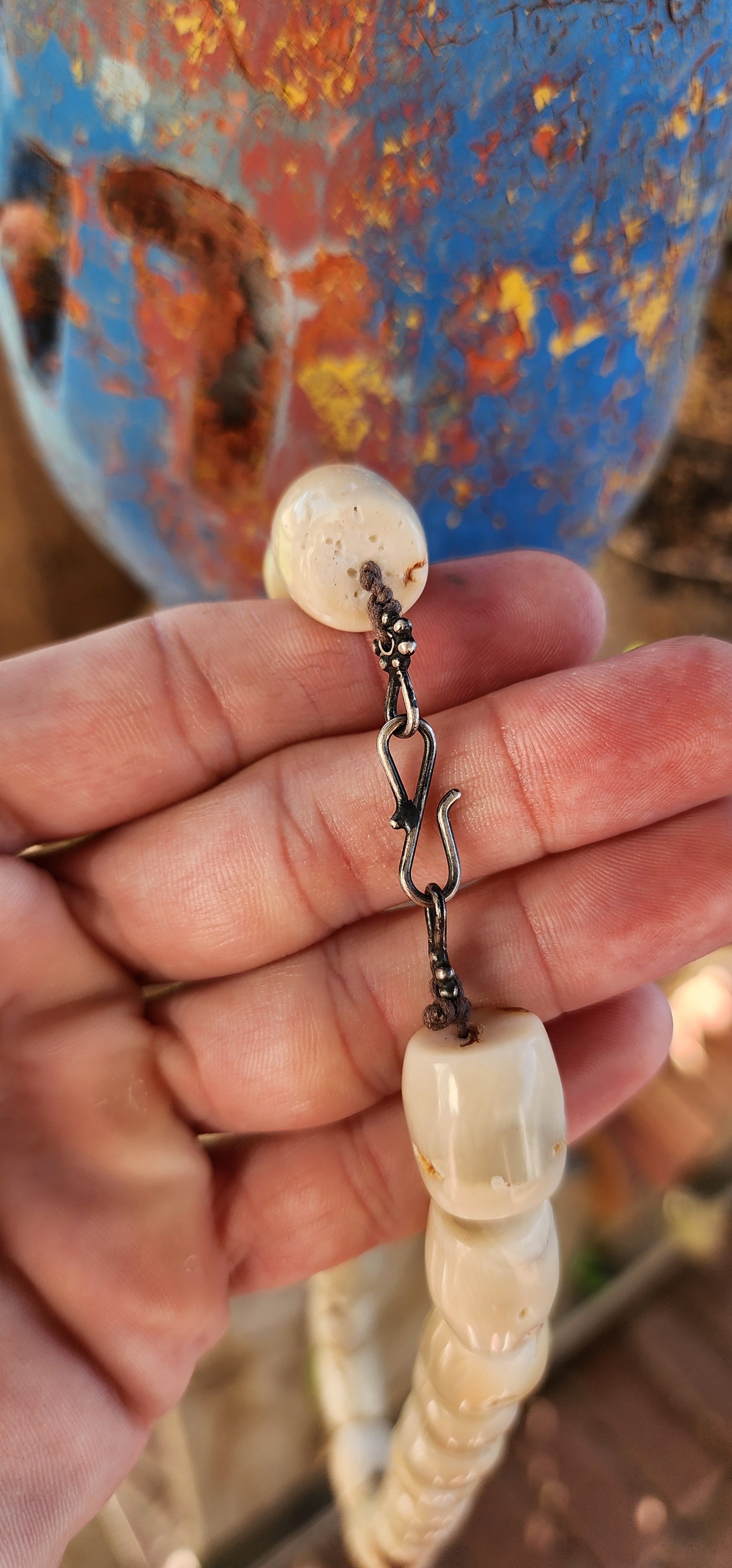 Meet your new statement-maker! This bold and earthy necklace features chunky barrel-shaped bamboo coral beads in a soft creamy white hue, each one unique with its own natural grooves and character.