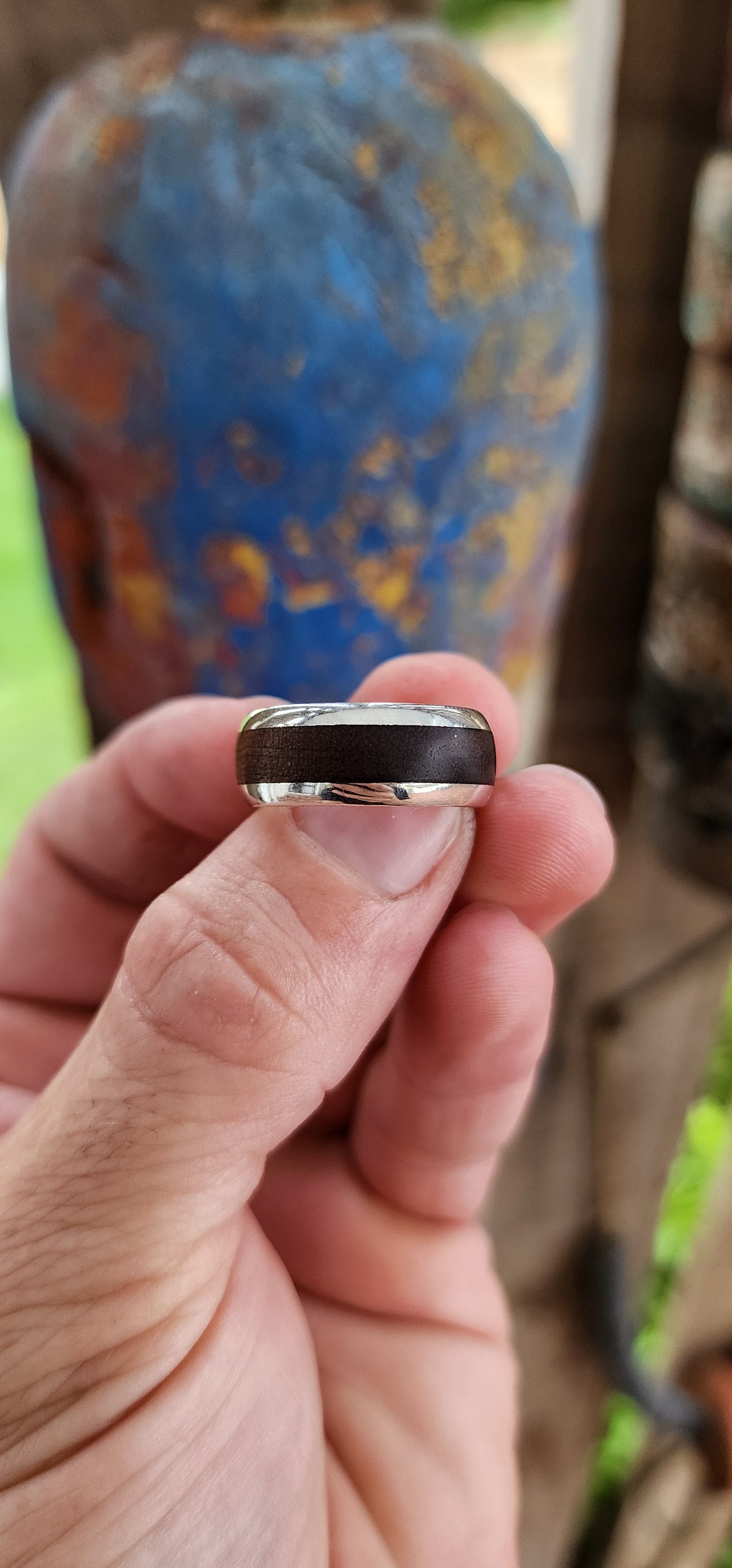 The Gentleman's Forge Ring.
This bold and rugged beauty is the perfect blend of nature and metal. Handcrafted with sterling silver, this chunky artisan ring doesn’t just whisper masculinity—it practically growls it.
