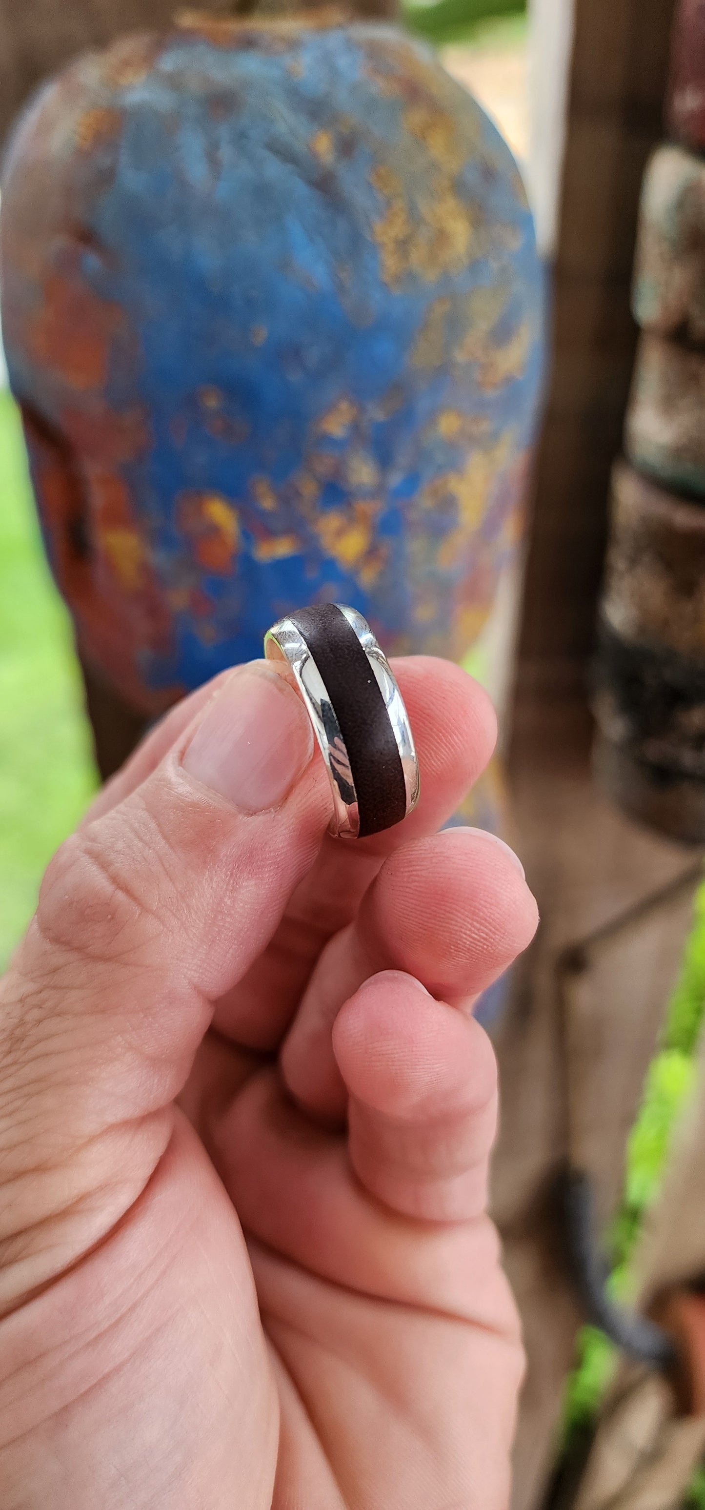 The Gentleman's Forge Ring.
This bold and rugged beauty is the perfect blend of nature and metal. Handcrafted with sterling silver, this chunky artisan ring doesn’t just whisper masculinity—it practically growls it.