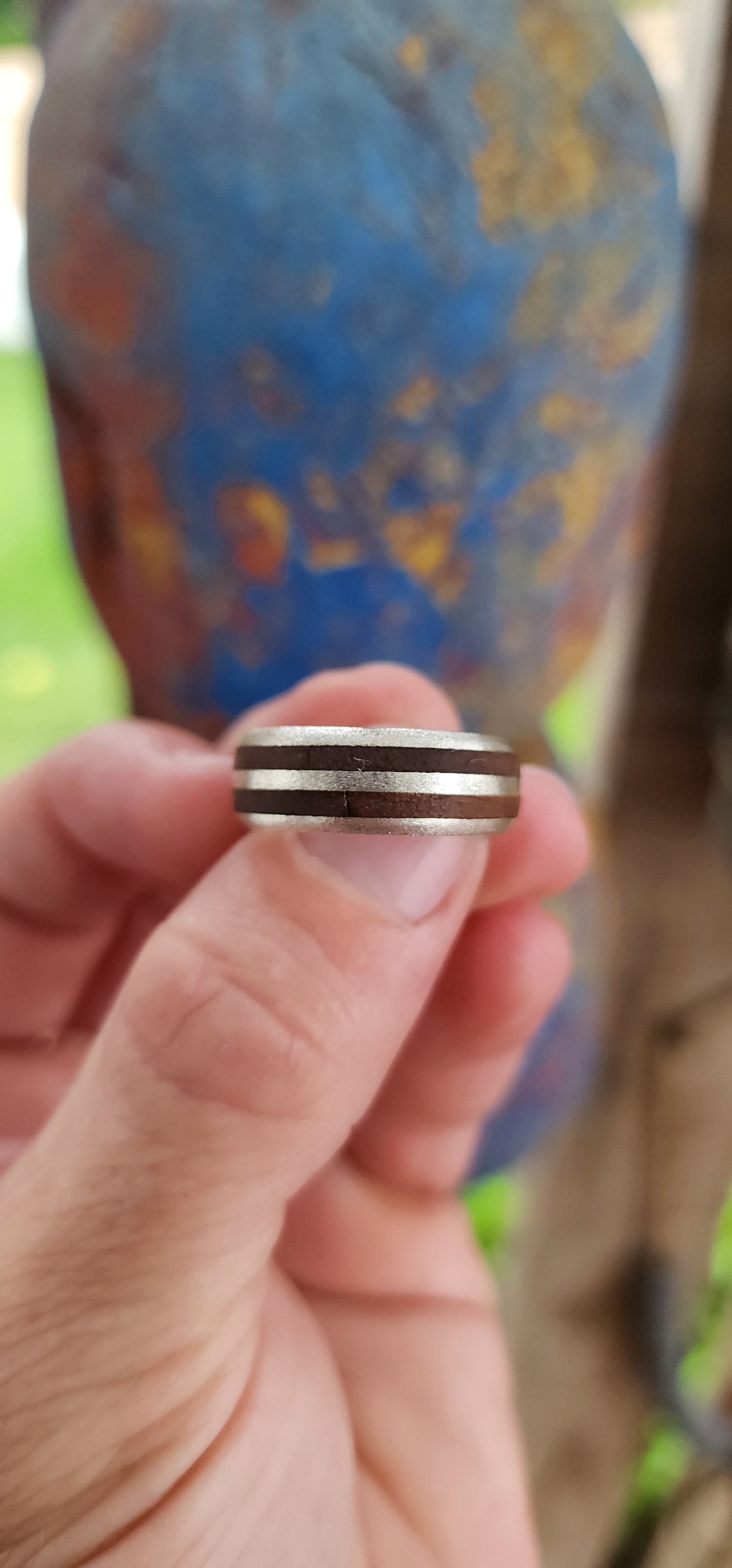 The Double Barrel Outlaw Ring.
This one’s got serious attitude! A chunky, battle-ready band, this ring fuses rustic charm with rugged steel in perfect harmony.