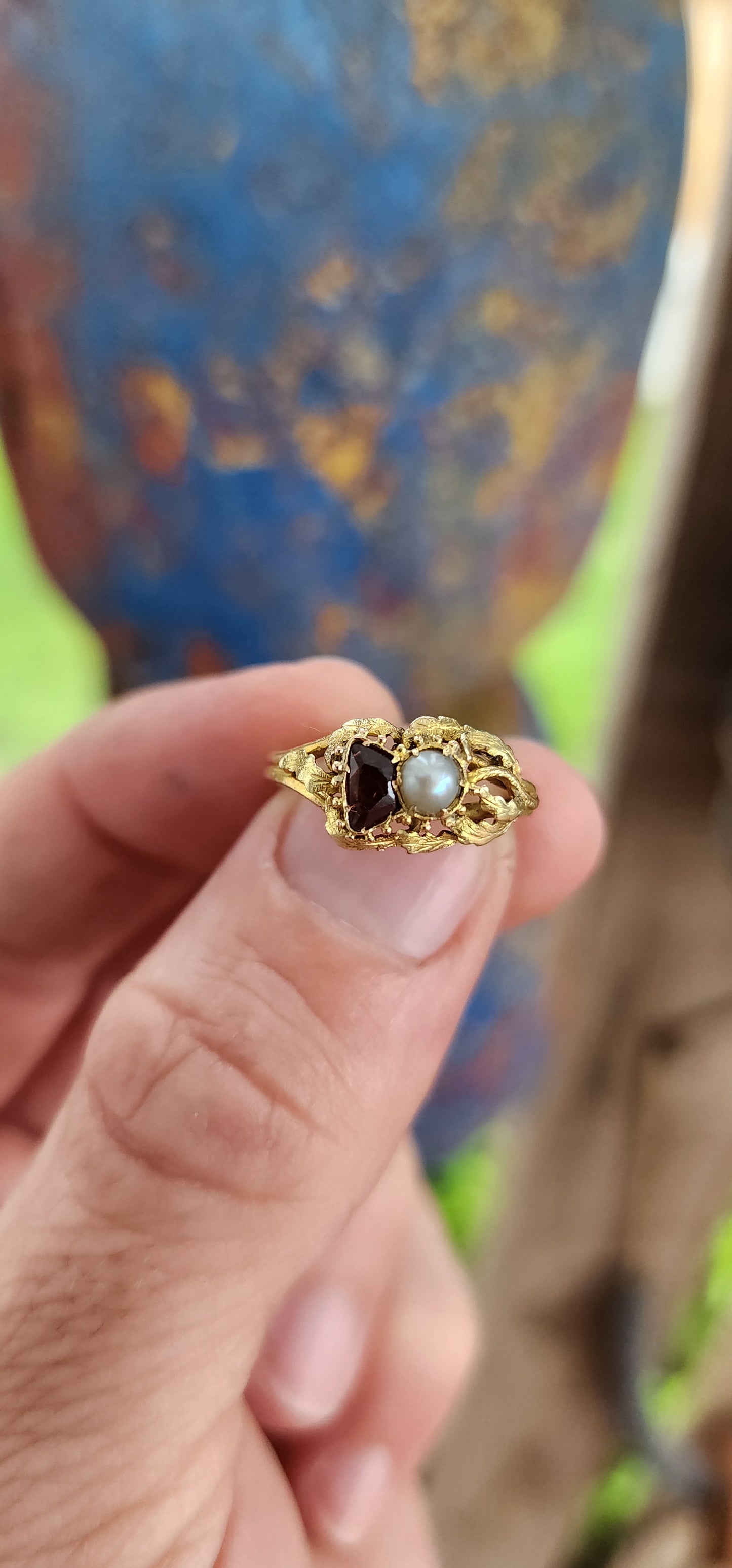 This is a marvelous and rare example of late Georgian to early Victorian mourning jewelry, specifically a mourning ring crafted in 15-carat yellow gold.
