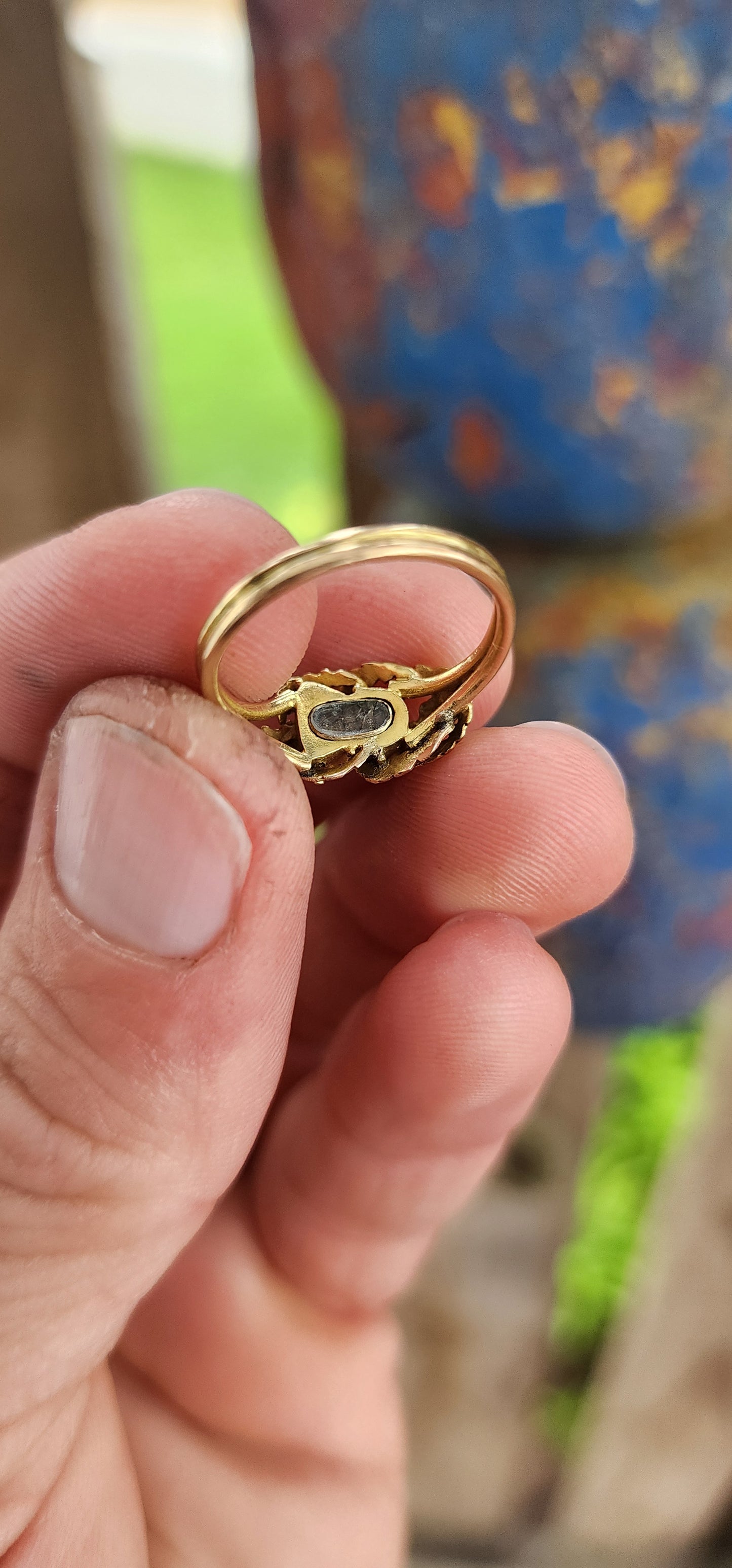 This is a marvelous and rare example of late Georgian to early Victorian mourning jewelry, specifically a mourning ring crafted in 15-carat yellow gold.