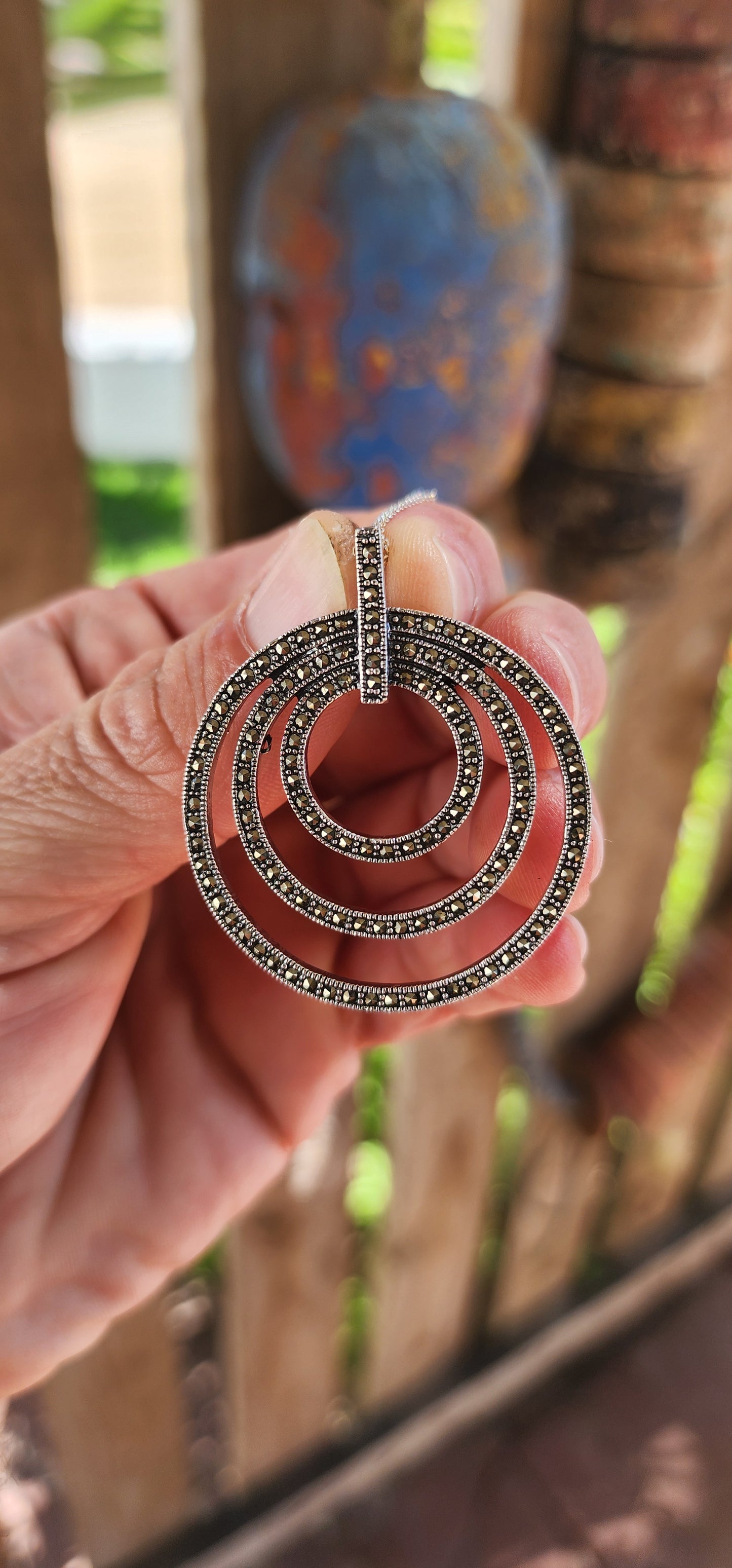 This pendant is pure glam with a modern twist — a total showstopper for lovers of bold geometry and old-school sparkle!