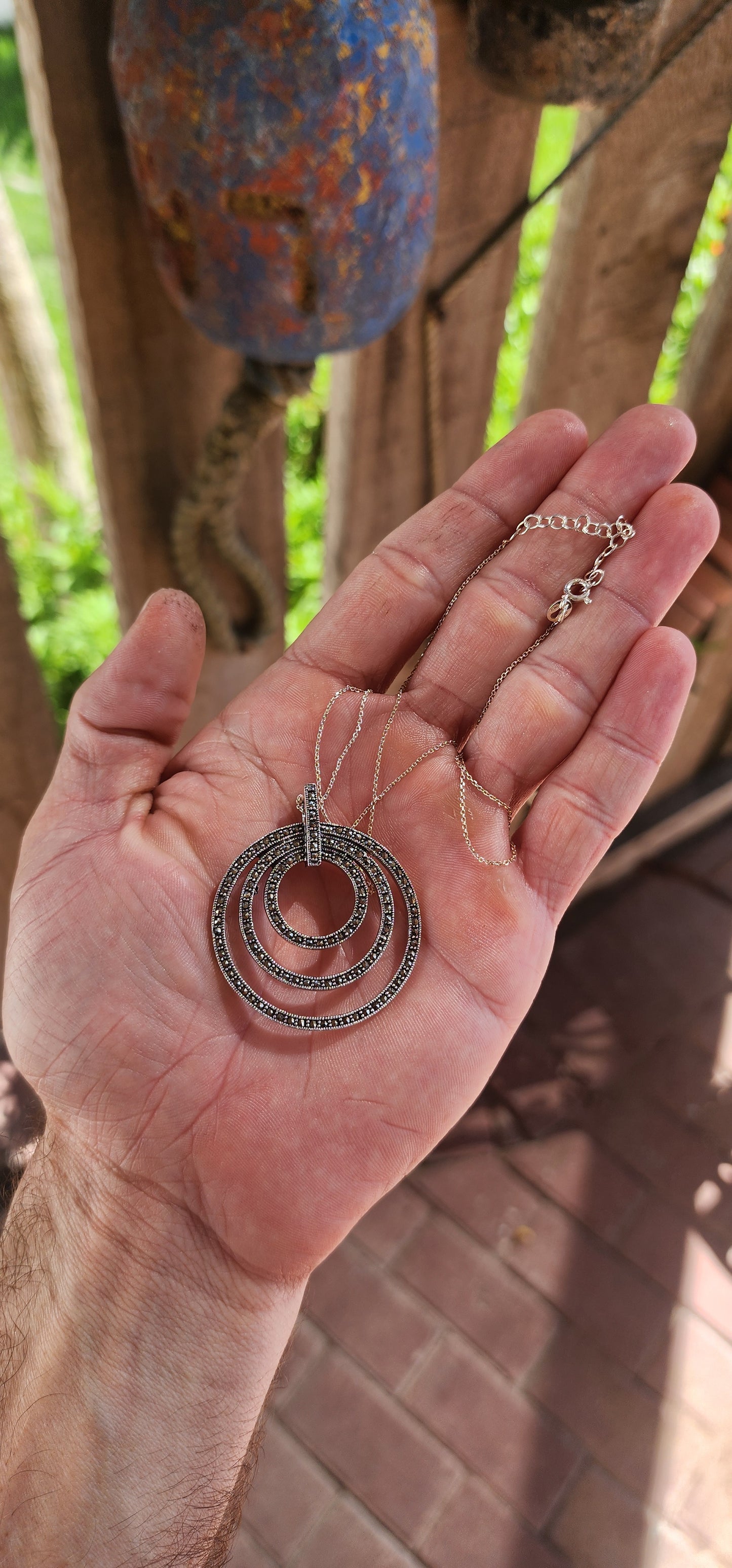 This pendant is pure glam with a modern twist — a total showstopper for lovers of bold geometry and old-school sparkle!