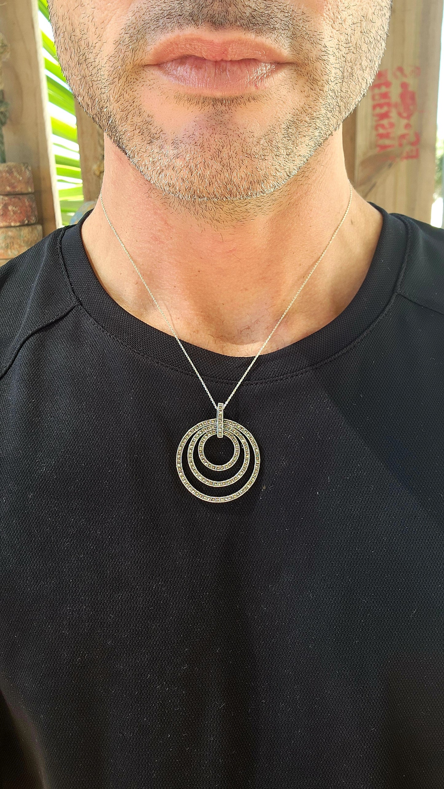 This pendant is pure glam with a modern twist — a total showstopper for lovers of bold geometry and old-school sparkle!