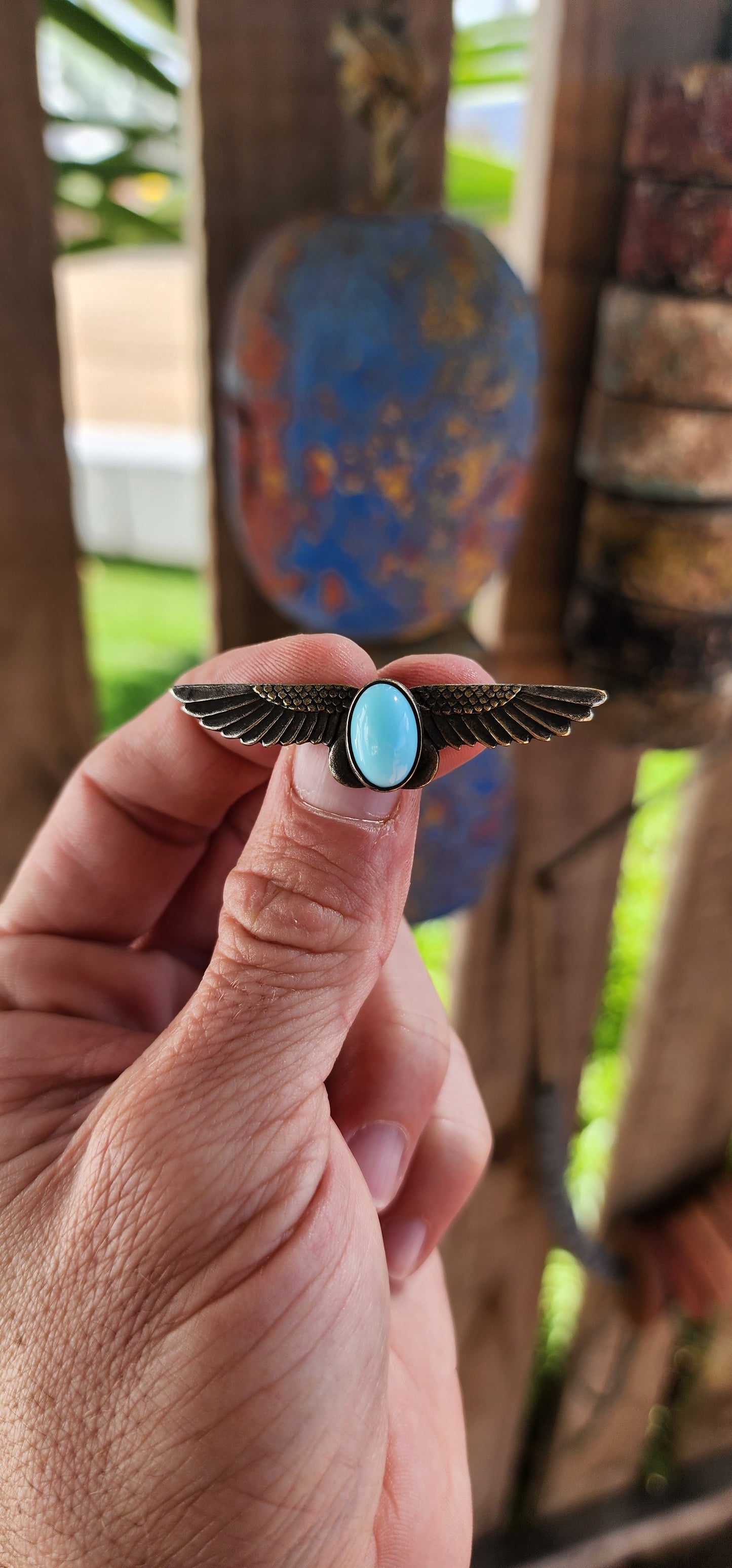 This beautifully crafted brooch is a striking example of Art Deco-era Egyptian Revival jewelry, dating from the 1920s to early 1930s.
