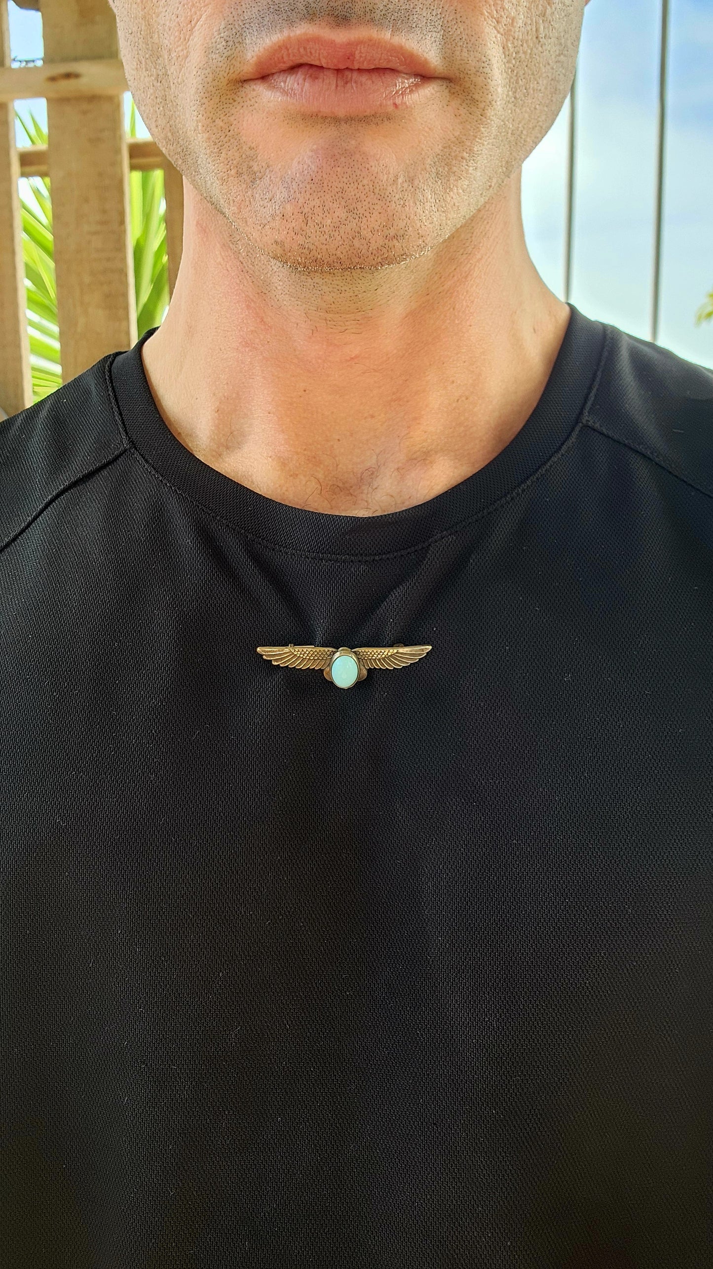 This beautifully crafted brooch is a striking example of Art Deco-era Egyptian Revival jewelry, dating from the 1920s to early 1930s.