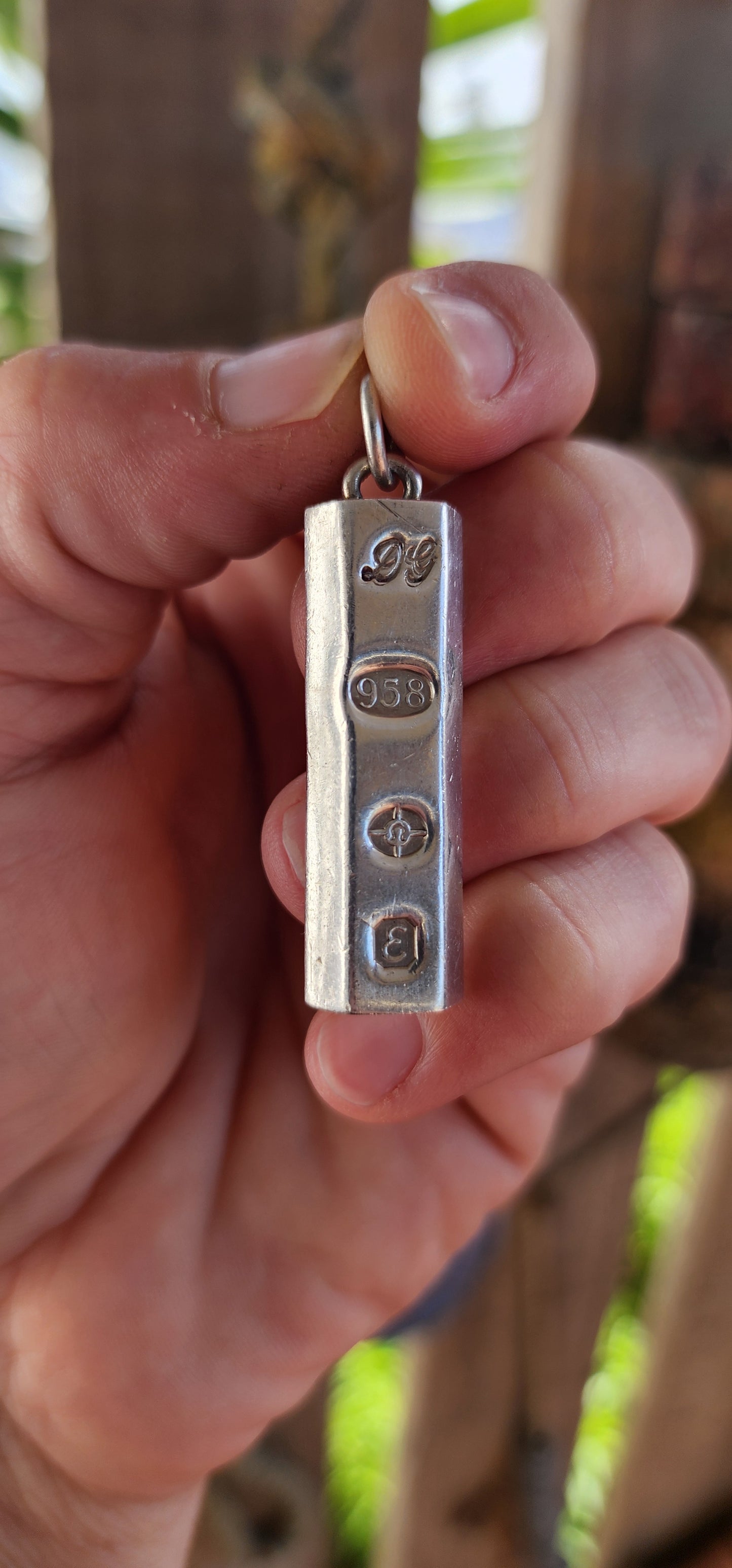 CHUNK OF SILVER!This vintage pendant is a bold and striking example of late 1970s British silver craftsmanship, modeled in the style of a "chocolate bar" or ingot.