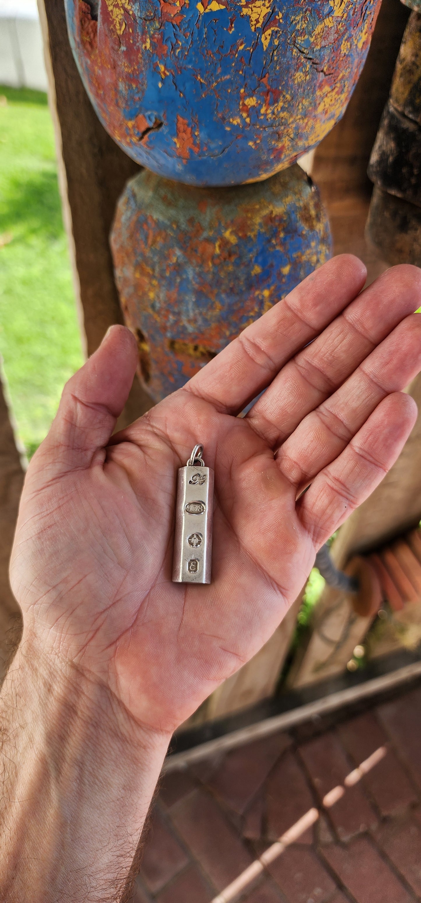 CHUNK OF SILVER!This vintage pendant is a bold and striking example of late 1970s British silver craftsmanship, modeled in the style of a "chocolate bar" or ingot.