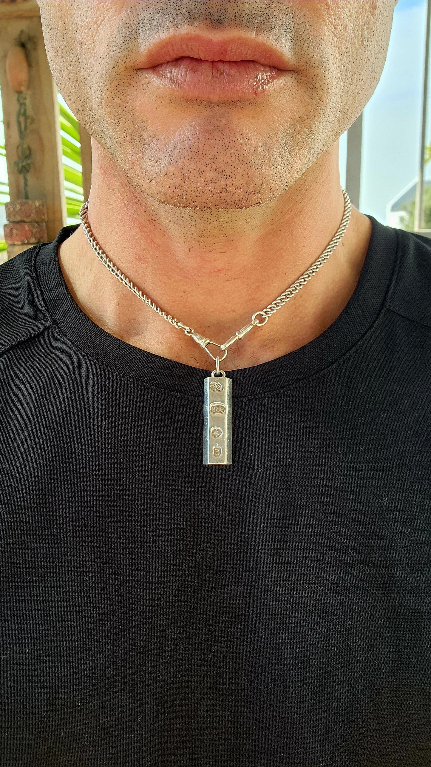 CHUNK OF SILVER!This vintage pendant is a bold and striking example of late 1970s British silver craftsmanship, modeled in the style of a "chocolate bar" or ingot.