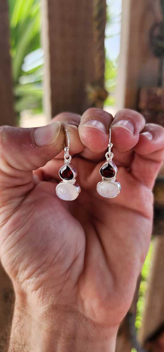 These sterling silver drop earrings are where sultry meets celestial.
