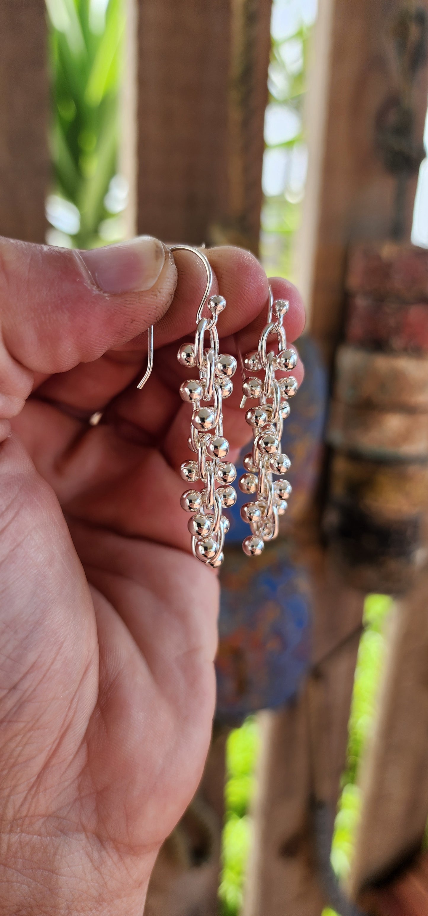 These striking contemporary sterling silver earrings are a masterclass in movement and modern design. Inspired by the elegant twist of a DNA double helix.