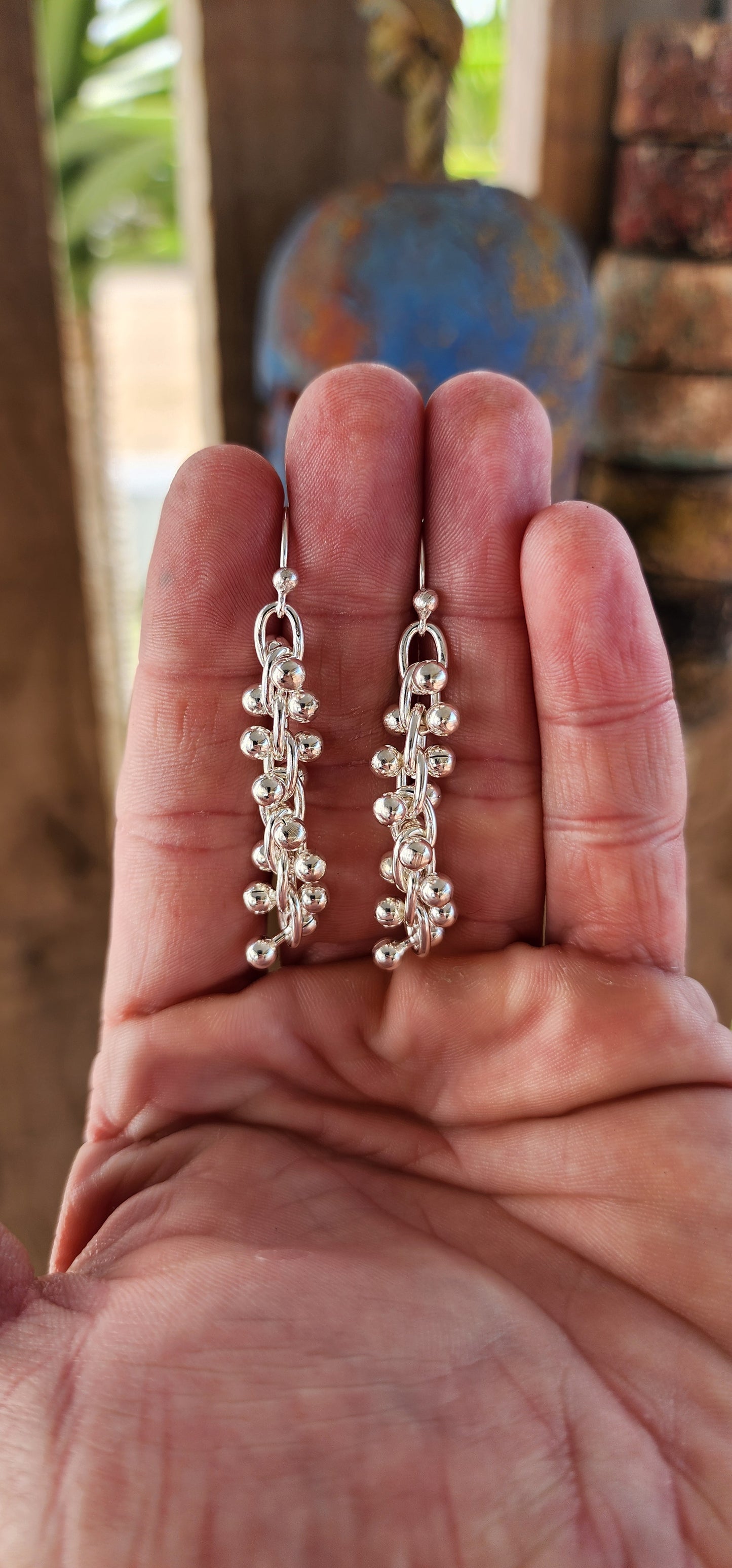 These striking contemporary sterling silver earrings are a masterclass in movement and modern design. Inspired by the elegant twist of a DNA double helix.