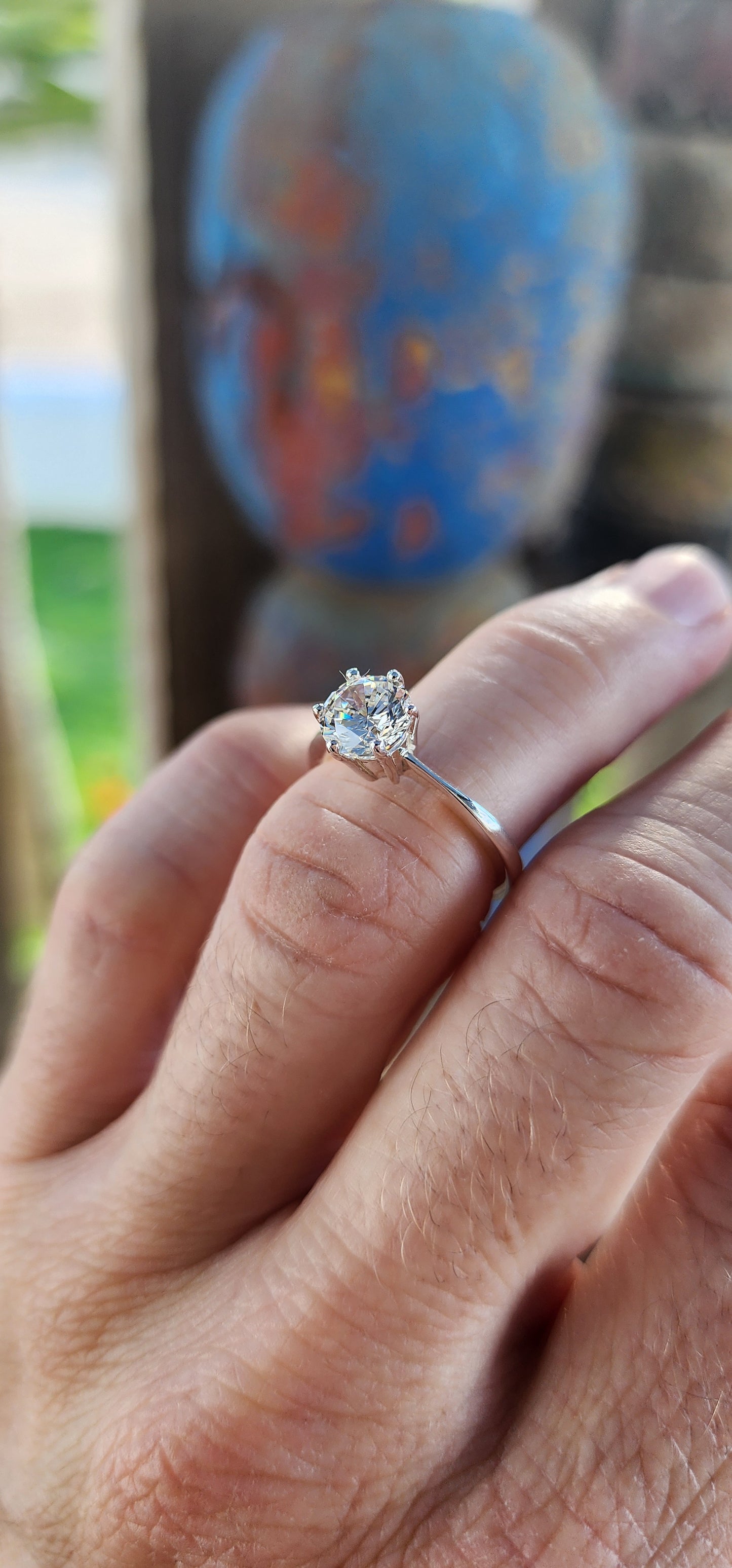 Step aside, diamonds—this sterling silver stunner is bringing the fire! Featuring a brilliant round-cut AAA-grade Swiss Cubic Zirconia, this solitaire ring is the definition of timeless sparkle with a twist of high drama.