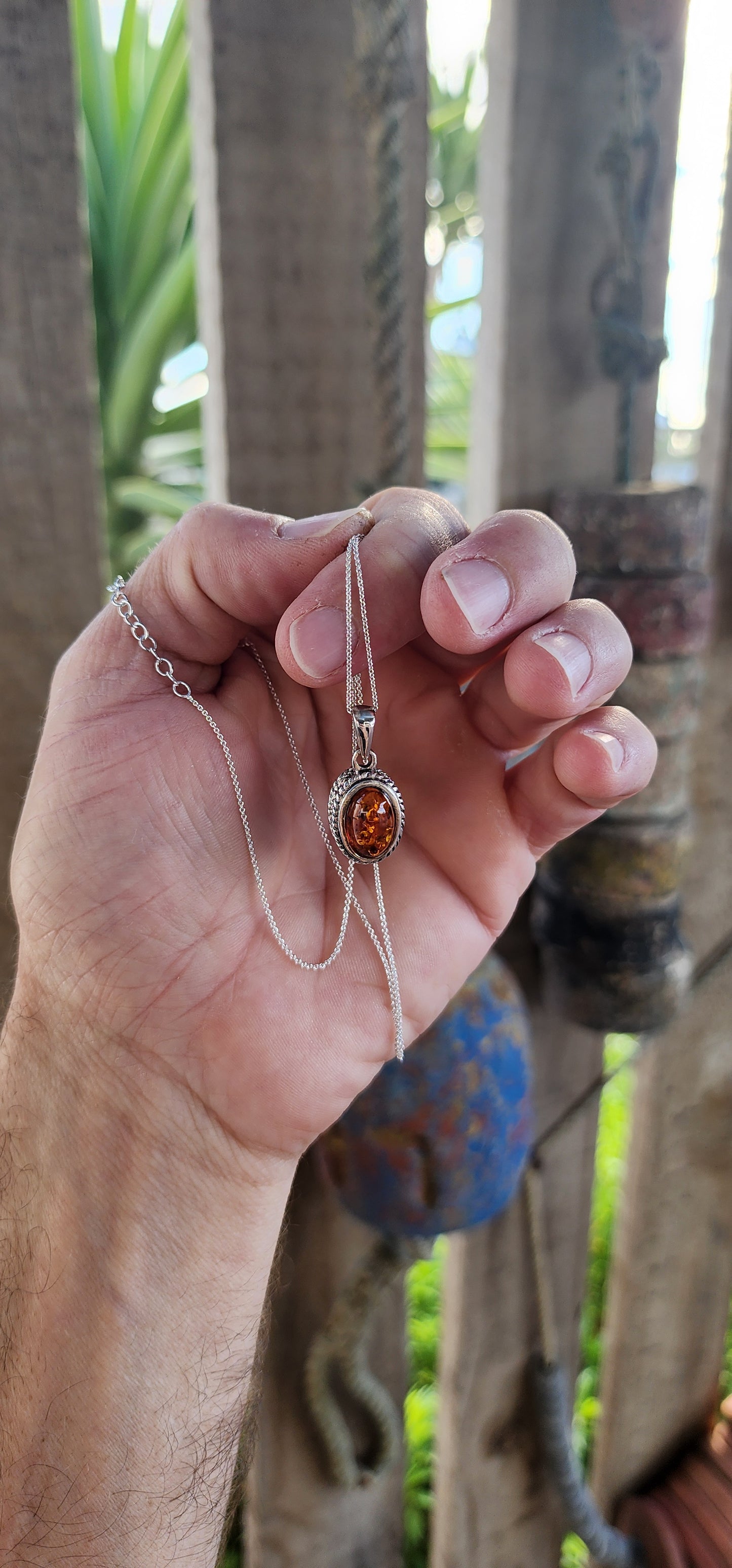 A Drop of Ancient Light: Sterling Silver & Baltic Amber Pendant Necklace.