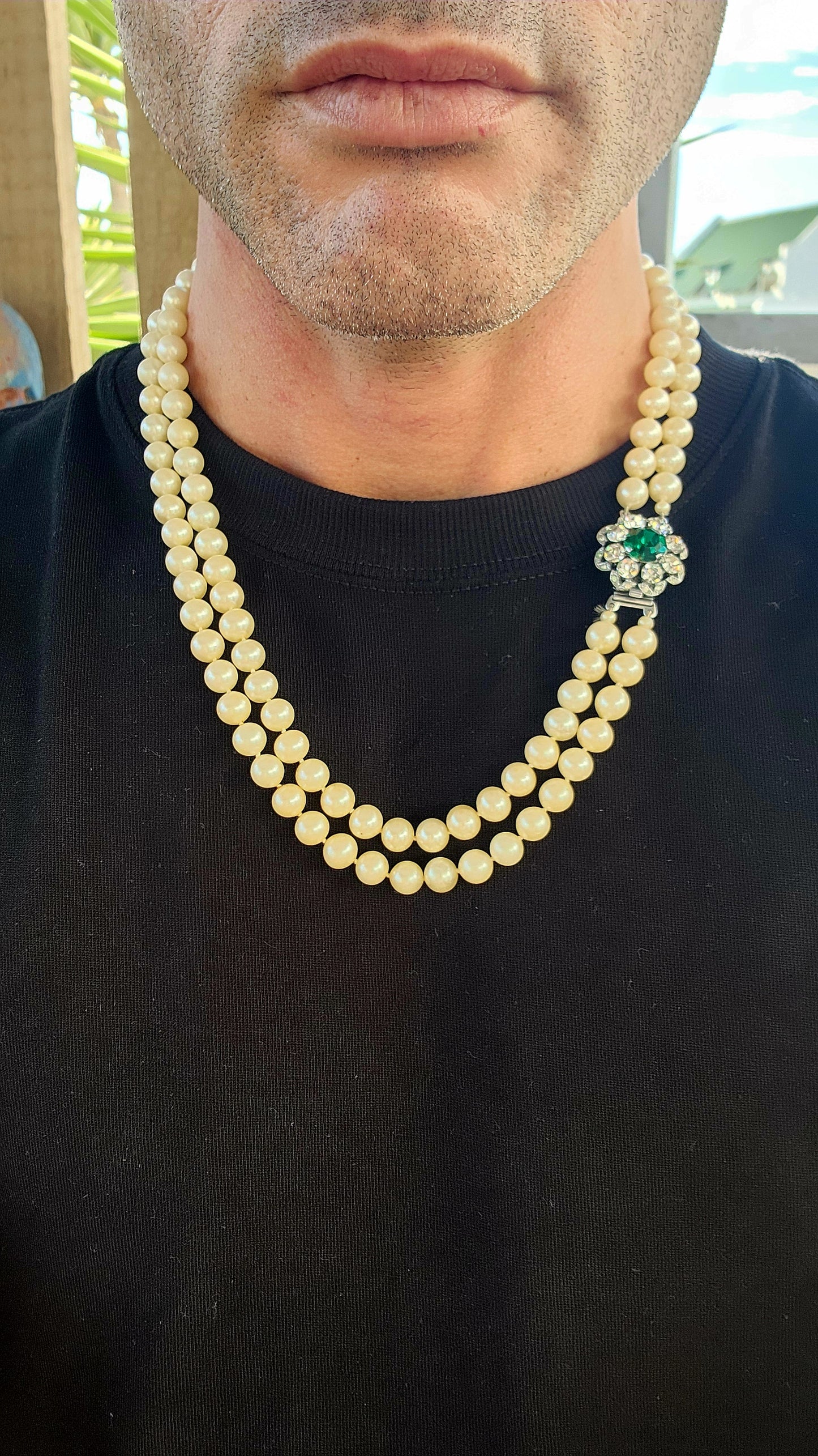 This fabulous Art Deco-era double strand costume necklace, dating to the glitzy 1940s, is pure vintage elegance with a side of silver screen sparkle. The strands are composed of rich, creamy glass faux pearls, each one lovingly hand-knotted.