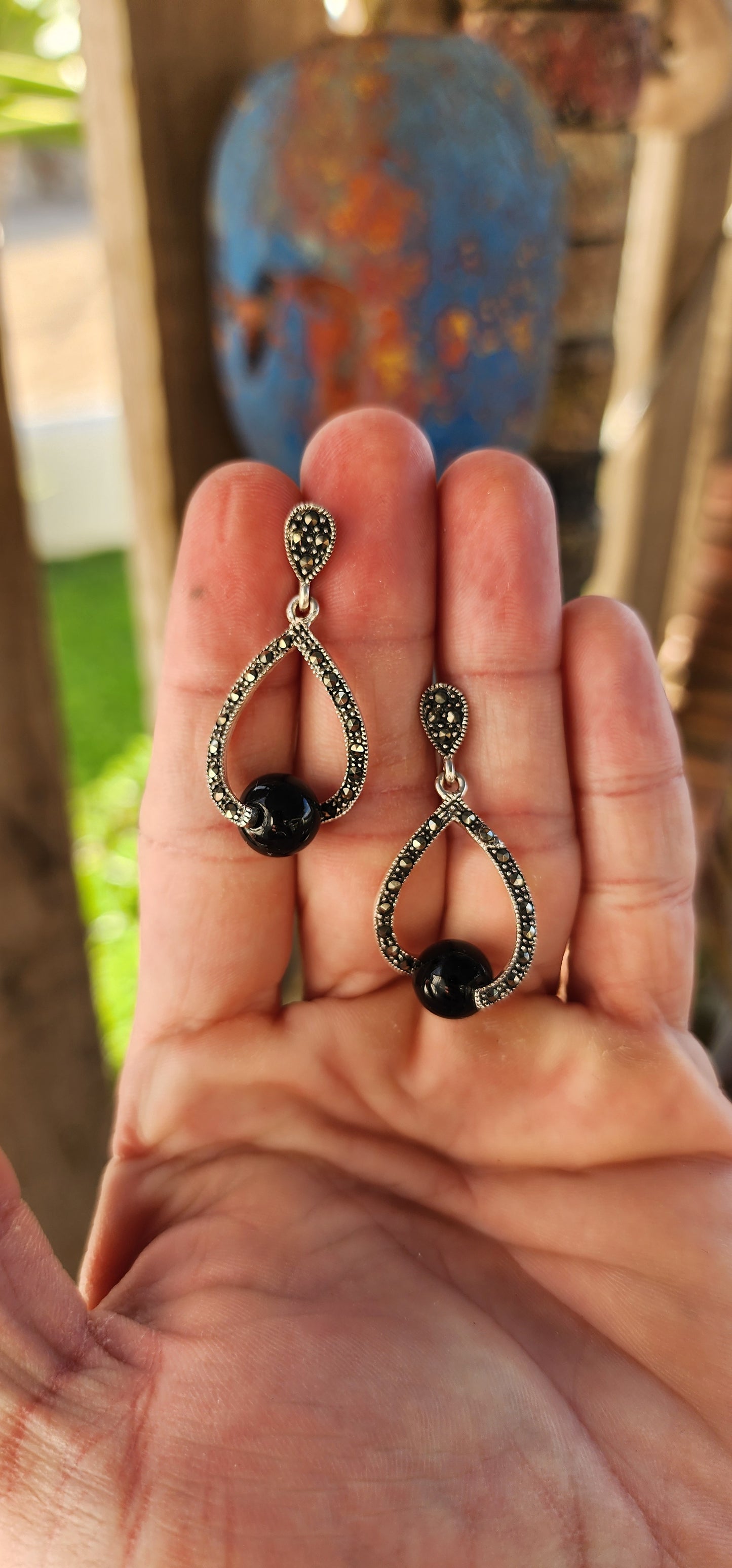 These elegant sterling silver dress earrings are pure Art Deco style fantasy — equal parts sophistication, geometry, and a touch of mystery.