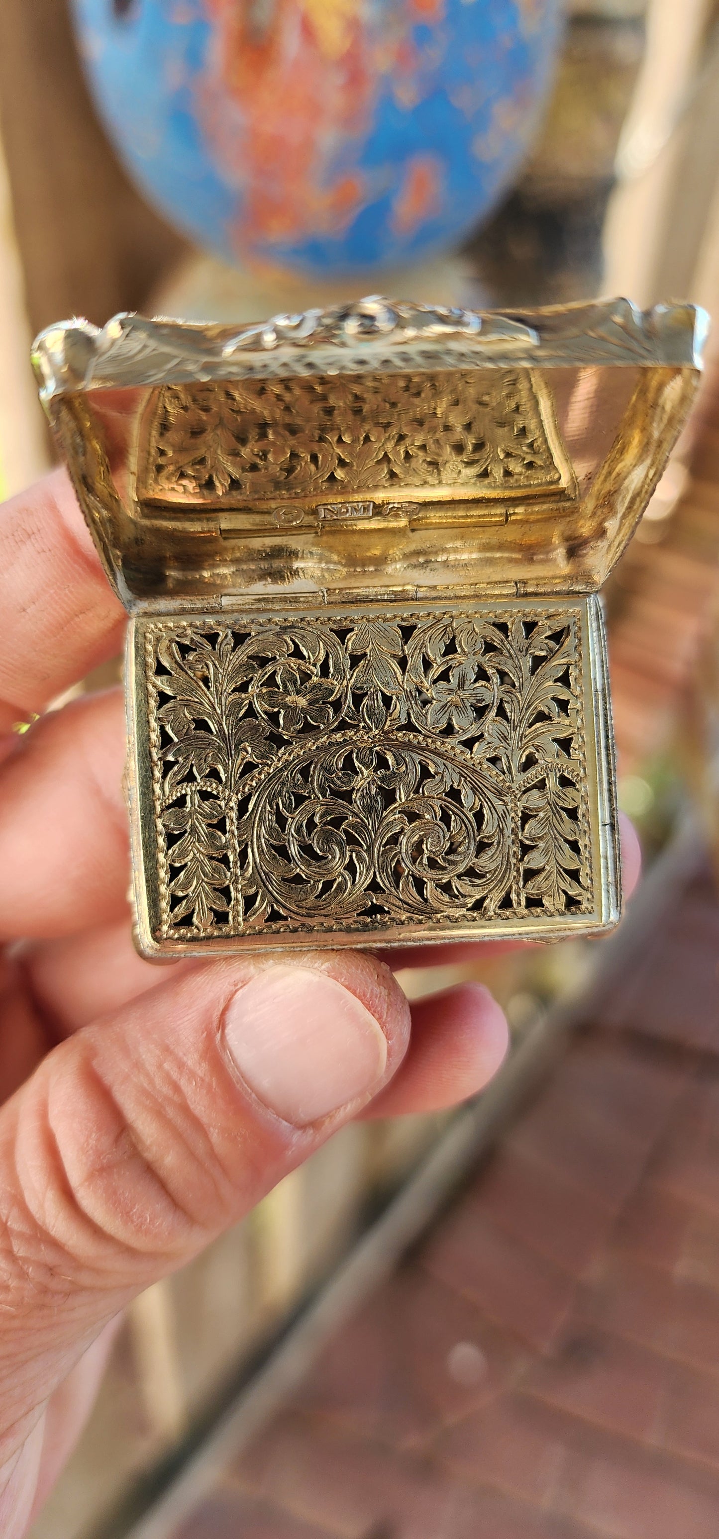 This exquisite silver-gilt vinaigrette box is a hallmark example of the craftsmanship of Nathaniel Mills, one of the most celebrated English silversmiths of the 19th century. Created around 1843 during the early Victorian era.