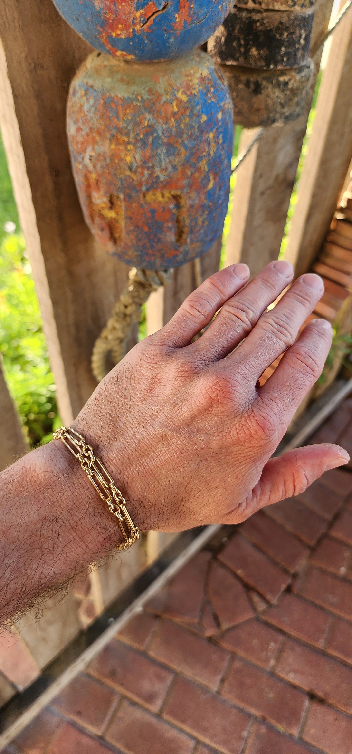 Say hello to a slice of wearable history — a fabulous antique fob chain that marries timeless sophistication with unmistakable golden swagger.This striking beauty is composed entirely of solid 18ct buttery yellow gold.
