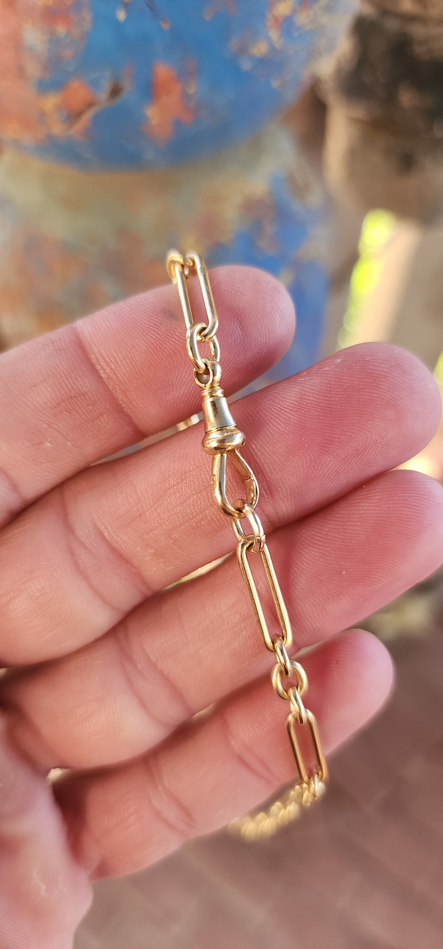 Say hello to a slice of wearable history — a fabulous antique fob chain that marries timeless sophistication with unmistakable golden swagger.This striking beauty is composed entirely of solid 18ct buttery yellow gold.