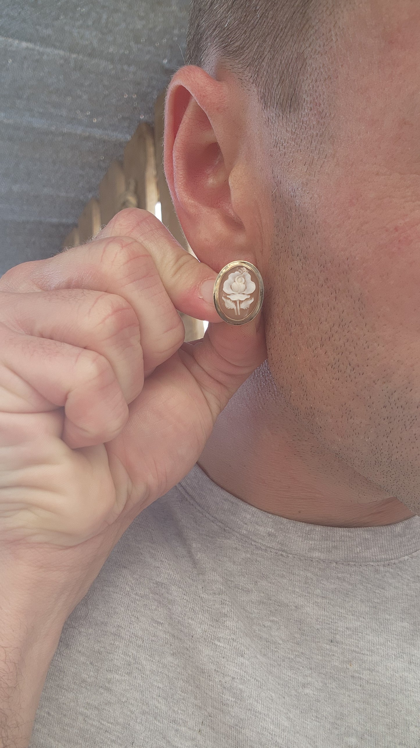 An Exquisite Pair of Mid-Century Carved Conch Shell Cameo Earrings, Circa 1950s.
These enchanting vintage earrings radiate timeless elegance, meticulously handcrafted during the mid-20th century and set in luxurious 14ct yellow gold.