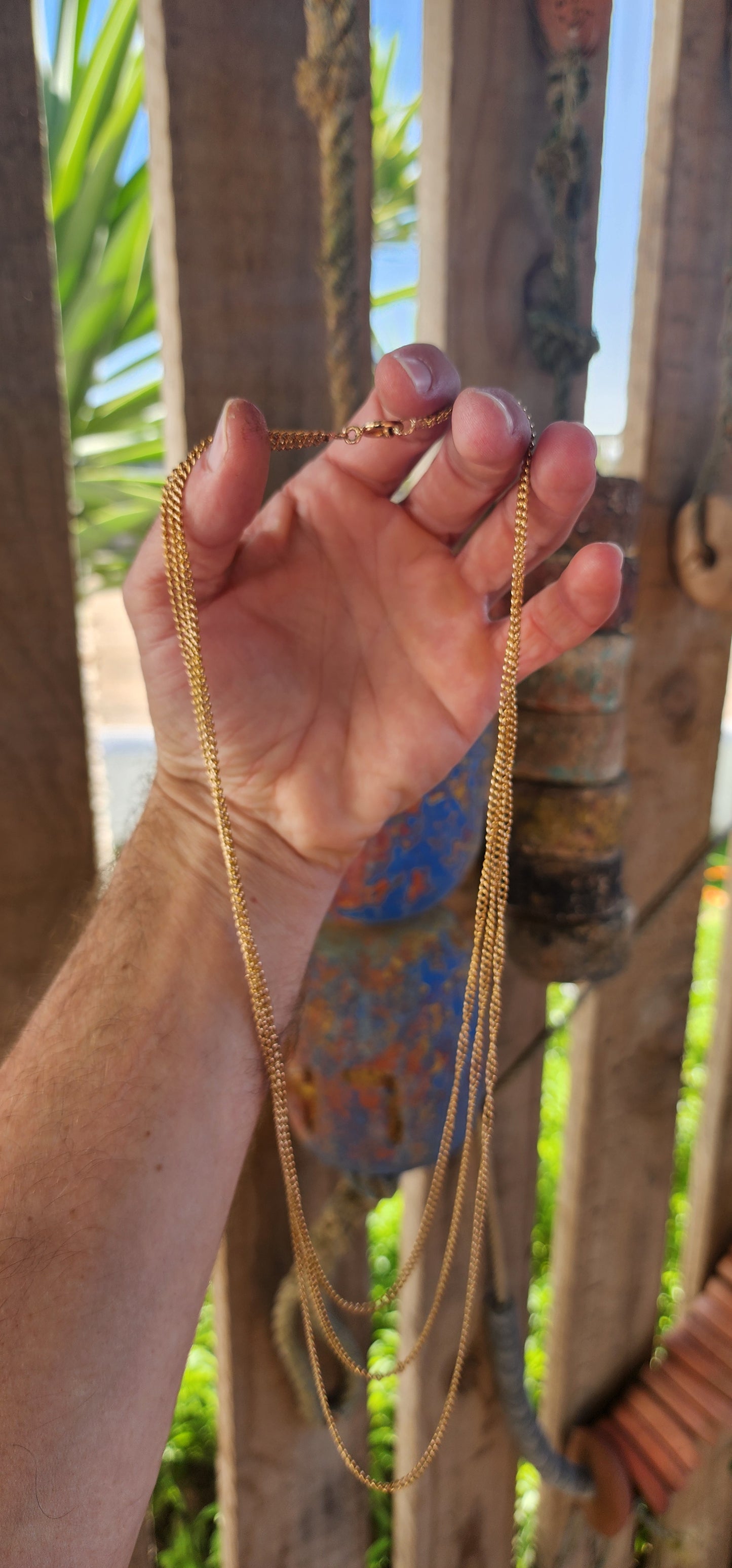 Behold this spectacular antique late Victorian-era 14ct yellow gold three-strand curb link chain necklace—a piece that whispers tales of timeless elegance and genteel grandeur.