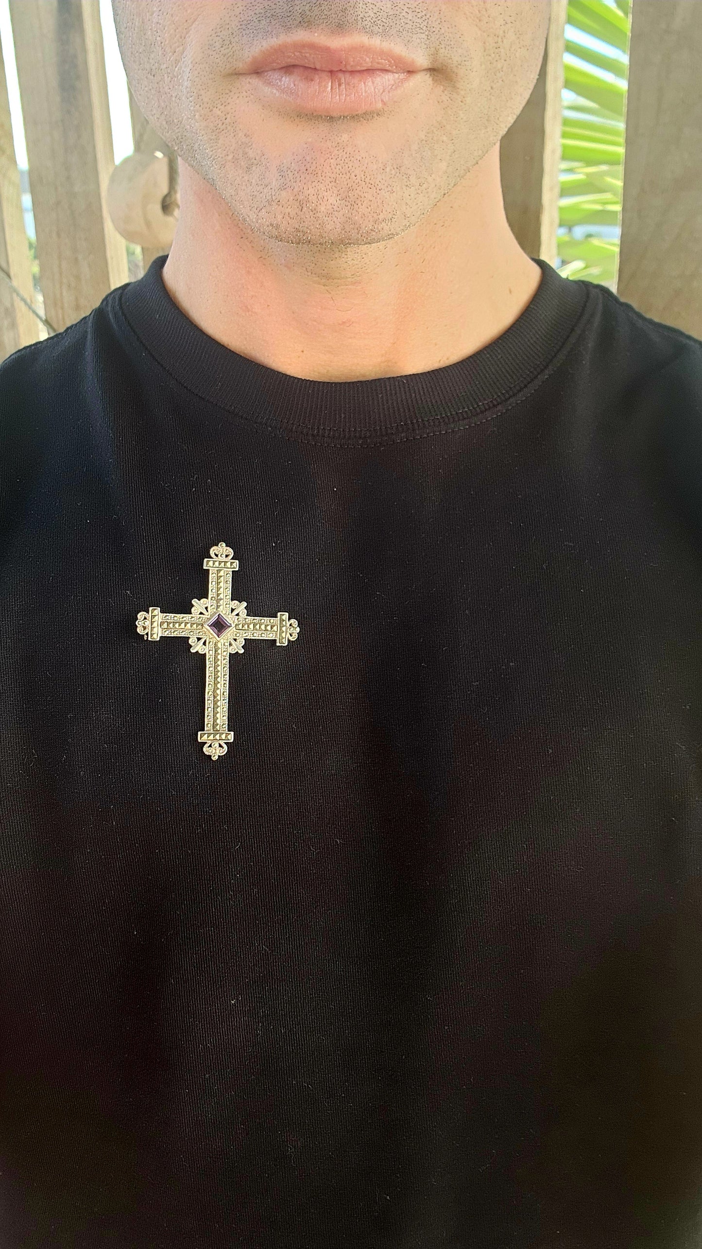 Fit for the breastplate of a crusader prince or the cloak of a baroque queen, this magnificent sterling silver cross brooch-pendant is nothing short of spectacular.