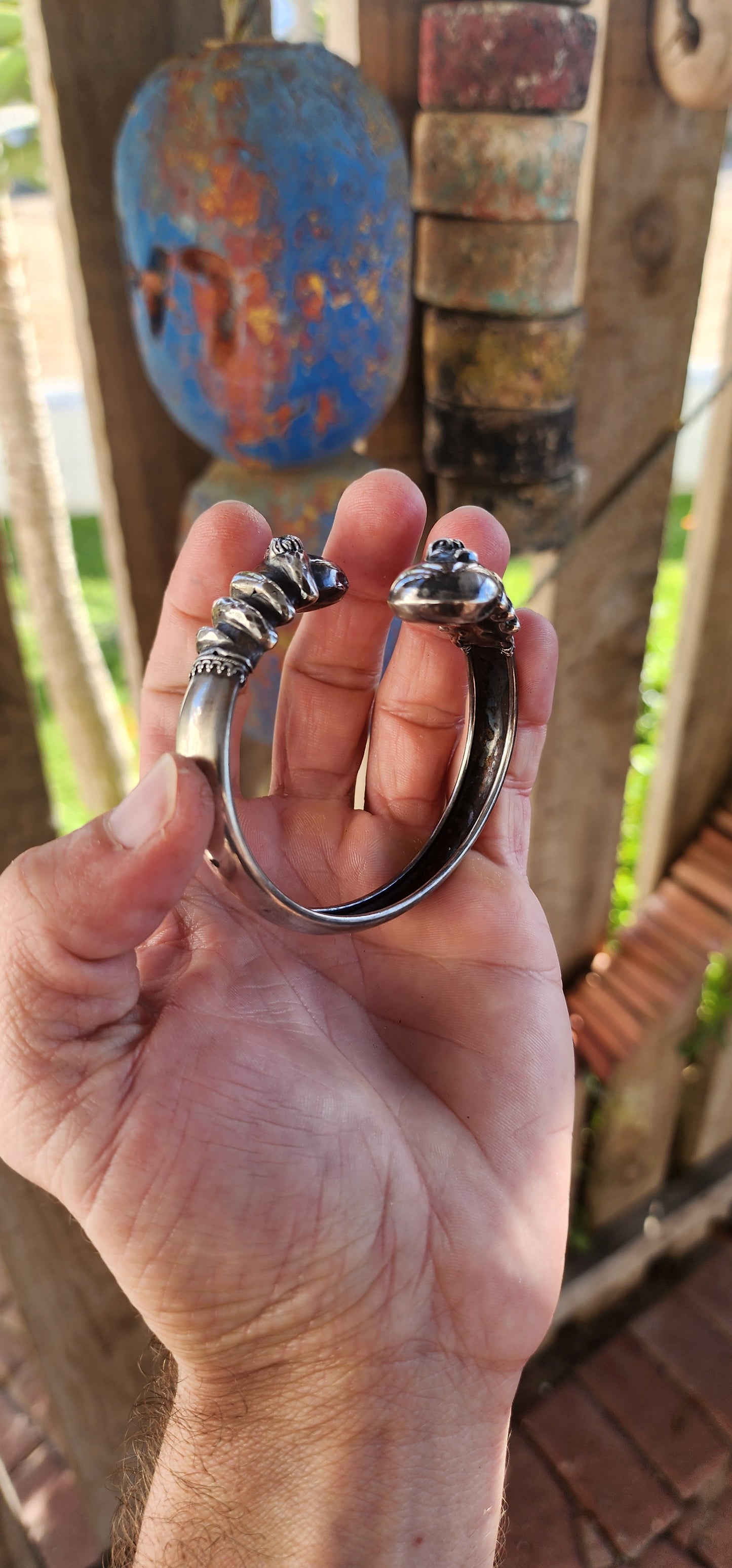Antique Victorian-Era Etruscan Revival Double Coiled Serpent Cuff Bangle in 800 Silver.
A bold echo of ancient mystery and Victorian imagination, this antique double-headed serpent cuff bangle is a striking example of Etruscan Revival artistry in silver.