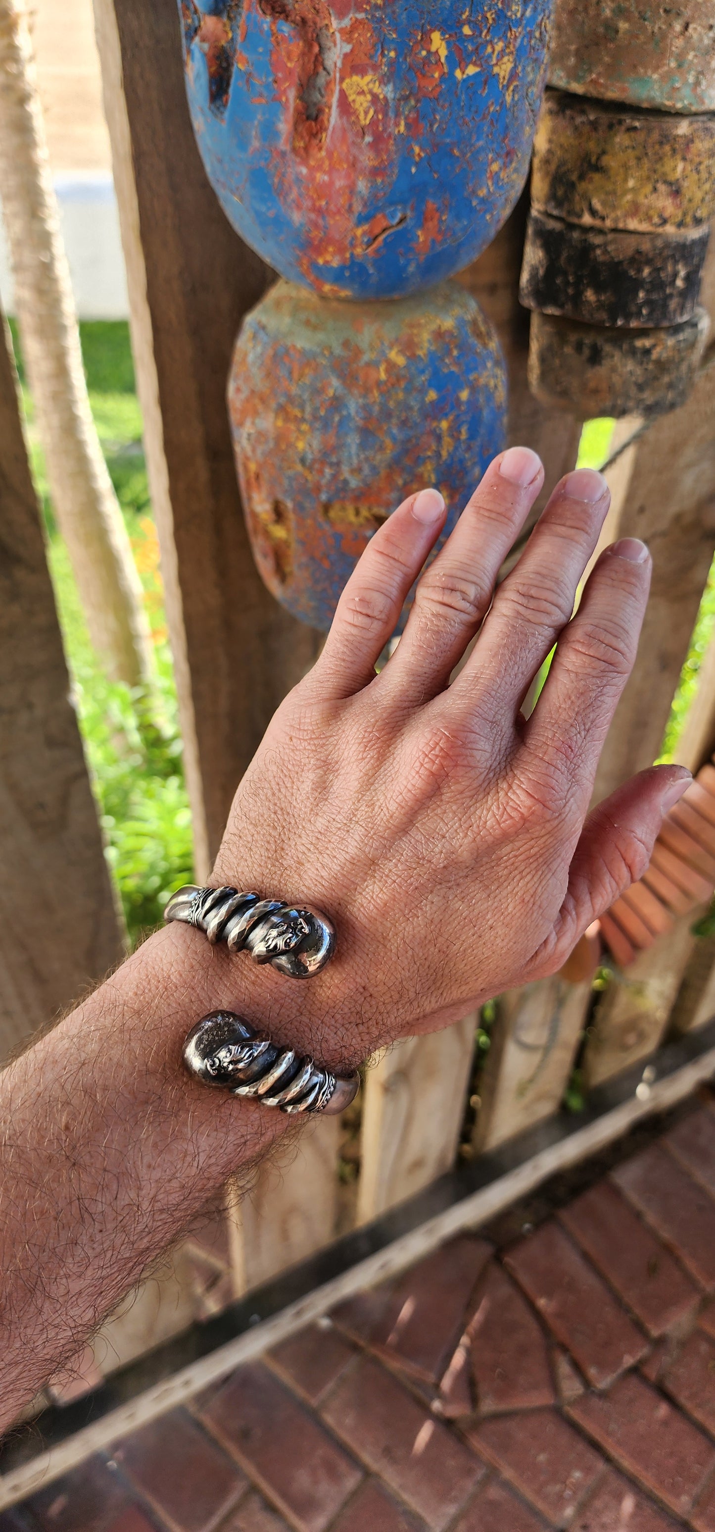 Antique Victorian-Era Etruscan Revival Double Coiled Serpent Cuff Bangle in 800 Silver.
A bold echo of ancient mystery and Victorian imagination, this antique double-headed serpent cuff bangle is a striking example of Etruscan Revival artistry in silver.