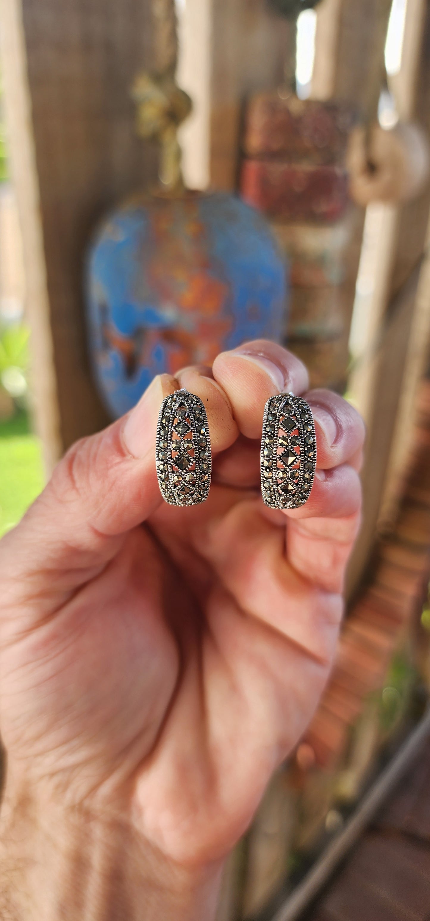 These vintage-inspired sterling silver earrings are like miniature Deco cathedrals for your ears—sophisticated, structured, and sparkling with timeless charm.