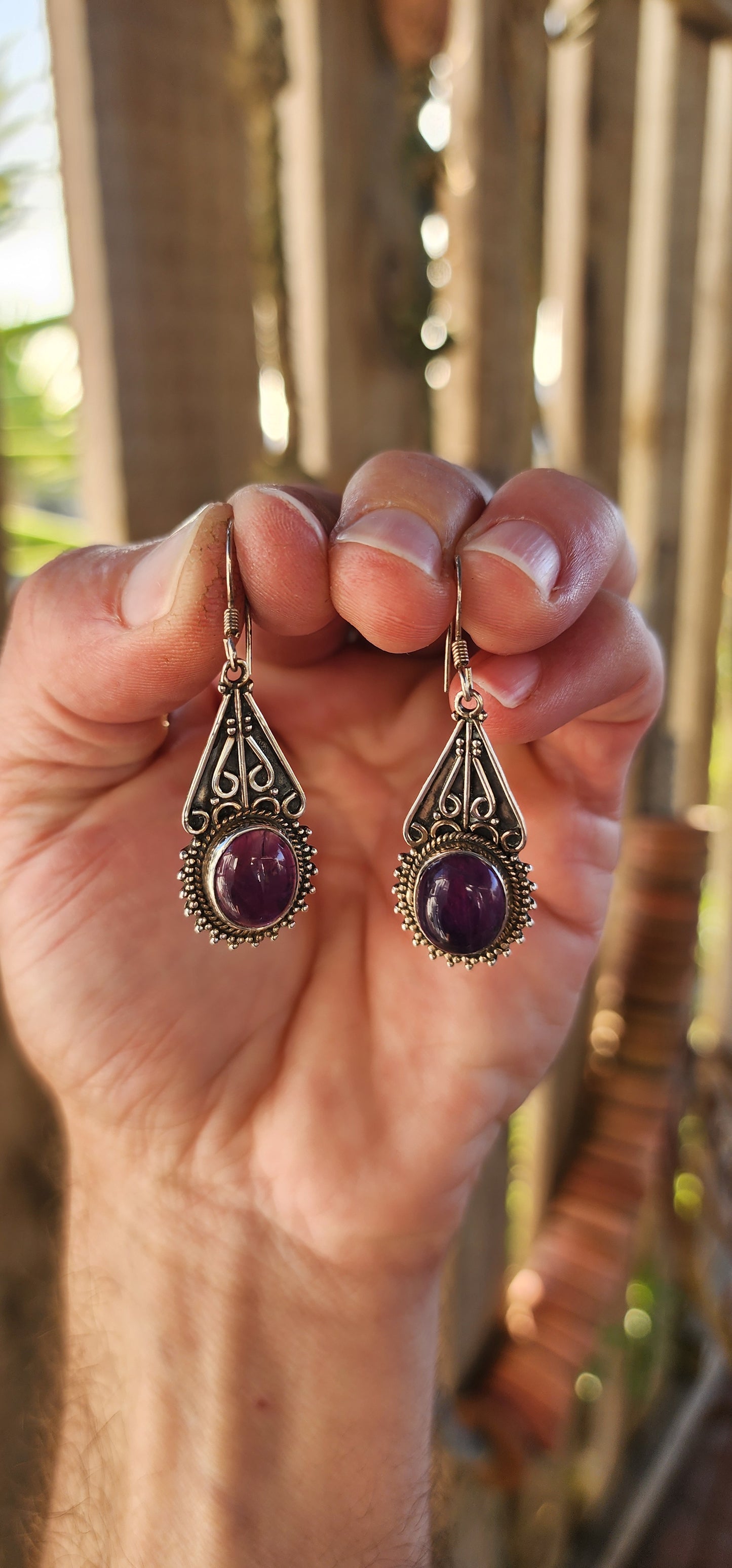 Channeling the spirit of bohemian wanderers and mystical moonlit markets, this fabulous pair of sterling silver drop earrings is pure wearable enchantment.