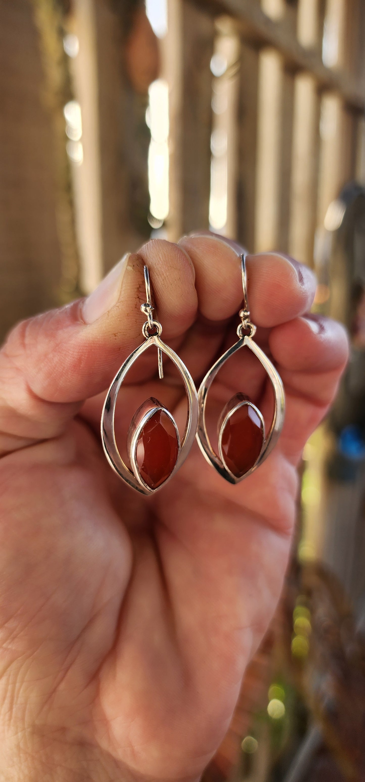 These earrings are like miniature sculptures—modernist marvels that flirt with geometry and gemstone magic!