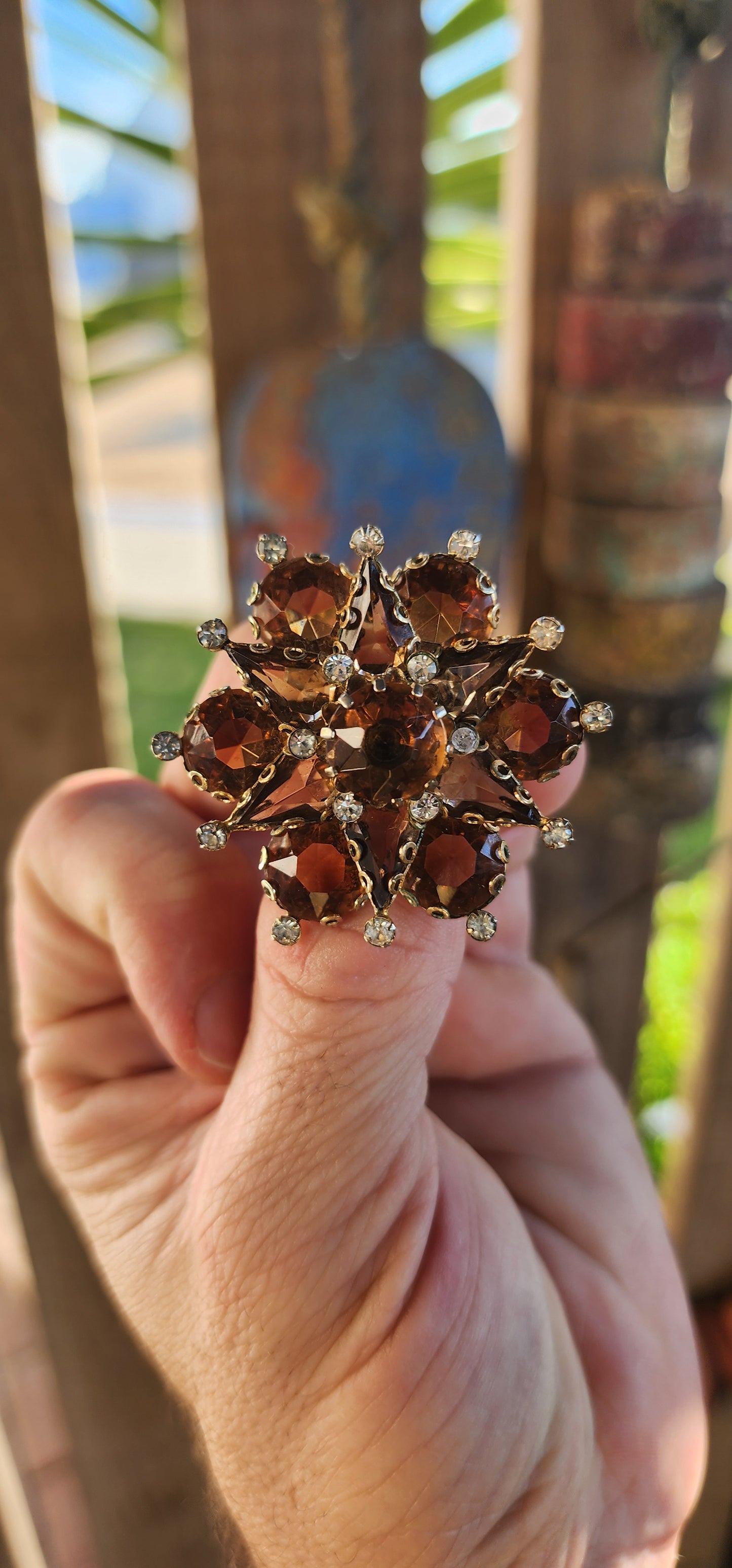 A Vintage Sparkle Explosion!
Step aside, plain brooches—this marvelous 1960s vintage costume dazzler is here to steal the show! Shaped like a starburst kissed by a flower, this three-dimensional beauty bursts with all the retro glamour you could dream of.