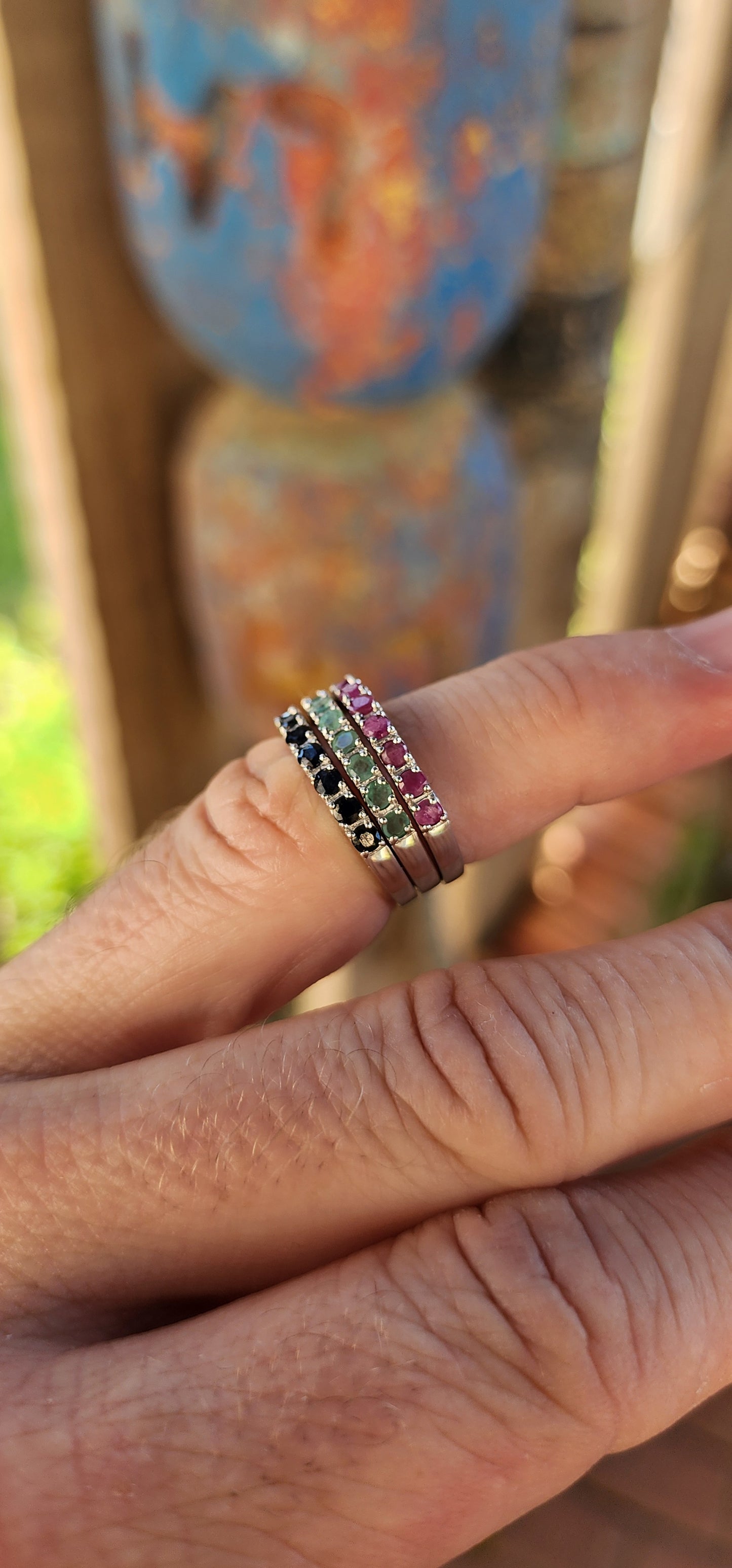 STACK 'EM HIGH – Sterling Silver Gemstone Eternity Bands!
Why settle for just one gem when you can indulge in a cascade of color and symbolism? These sterling silver half-eternity stacking rings are slim, stunning, and made to be mixed.