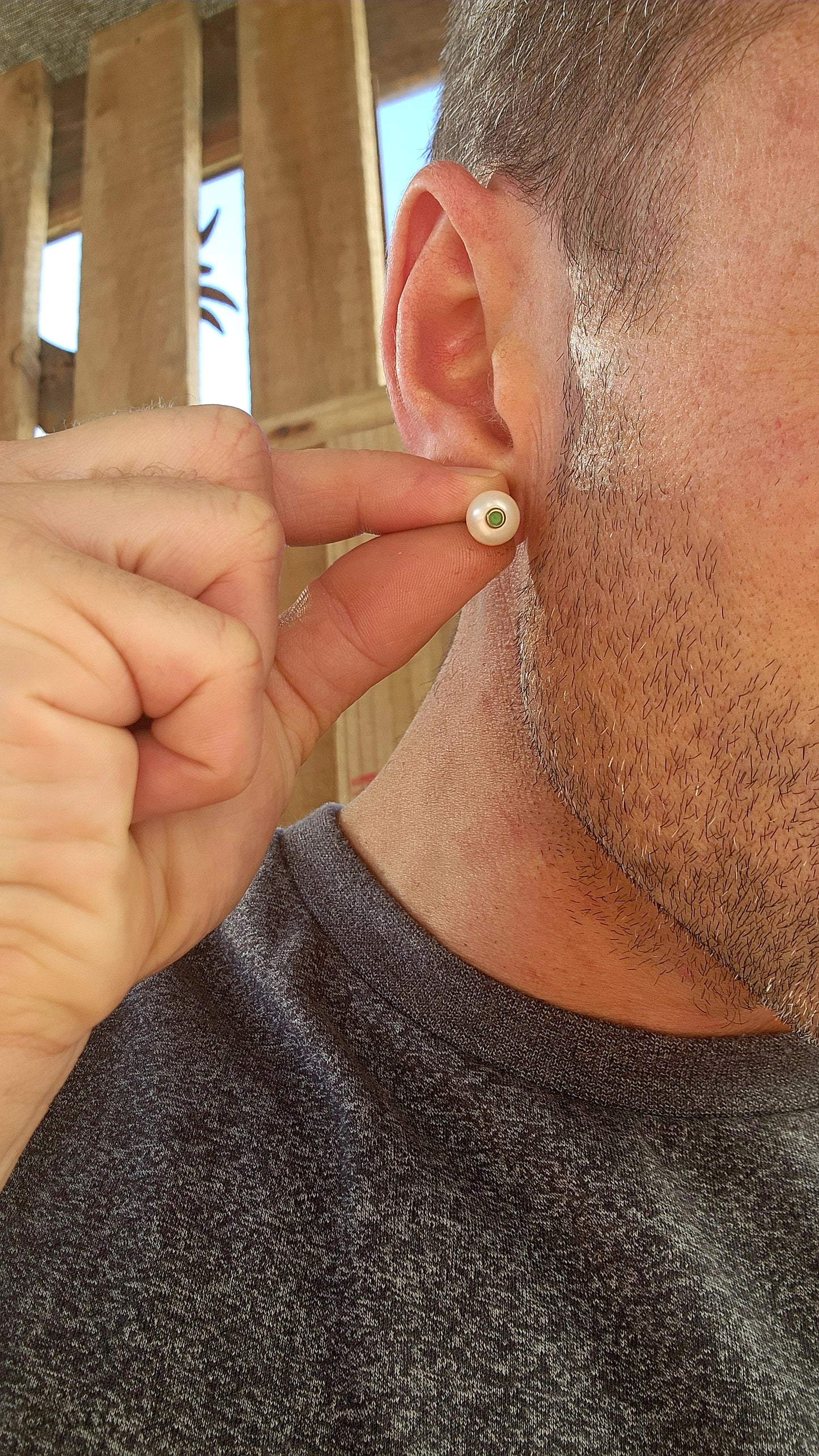 Add a dash of magic and a royal whisper of emerald enchantment with these captivating faux emerald and pearl stud earrings! Like tiny orbs of moonlight kissed by spring forests.